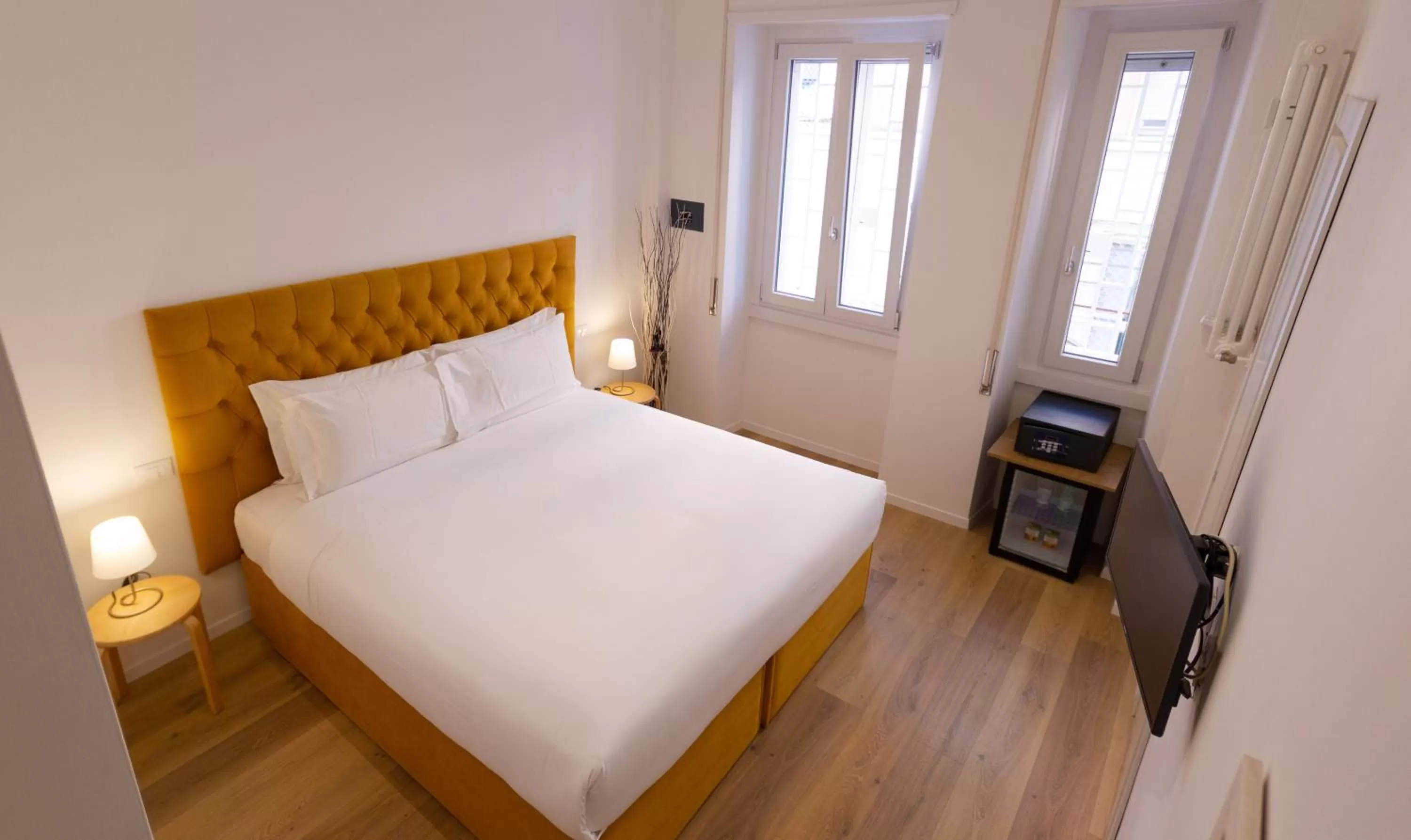 Bed in Michelangelo Vatican Rooms