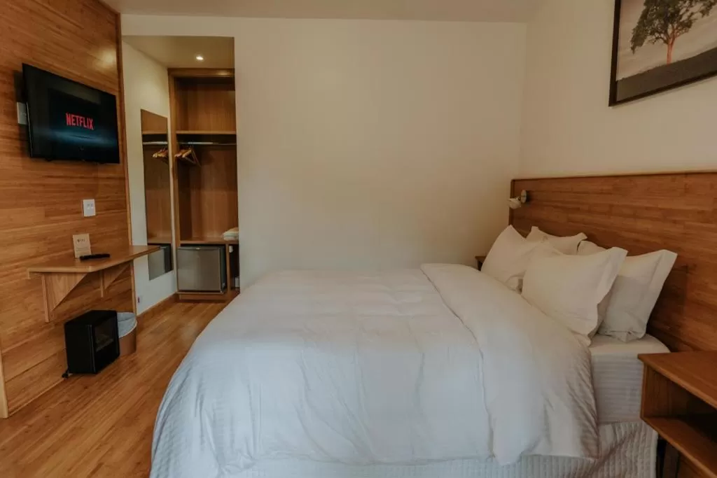 Bed in La Brume Pousada