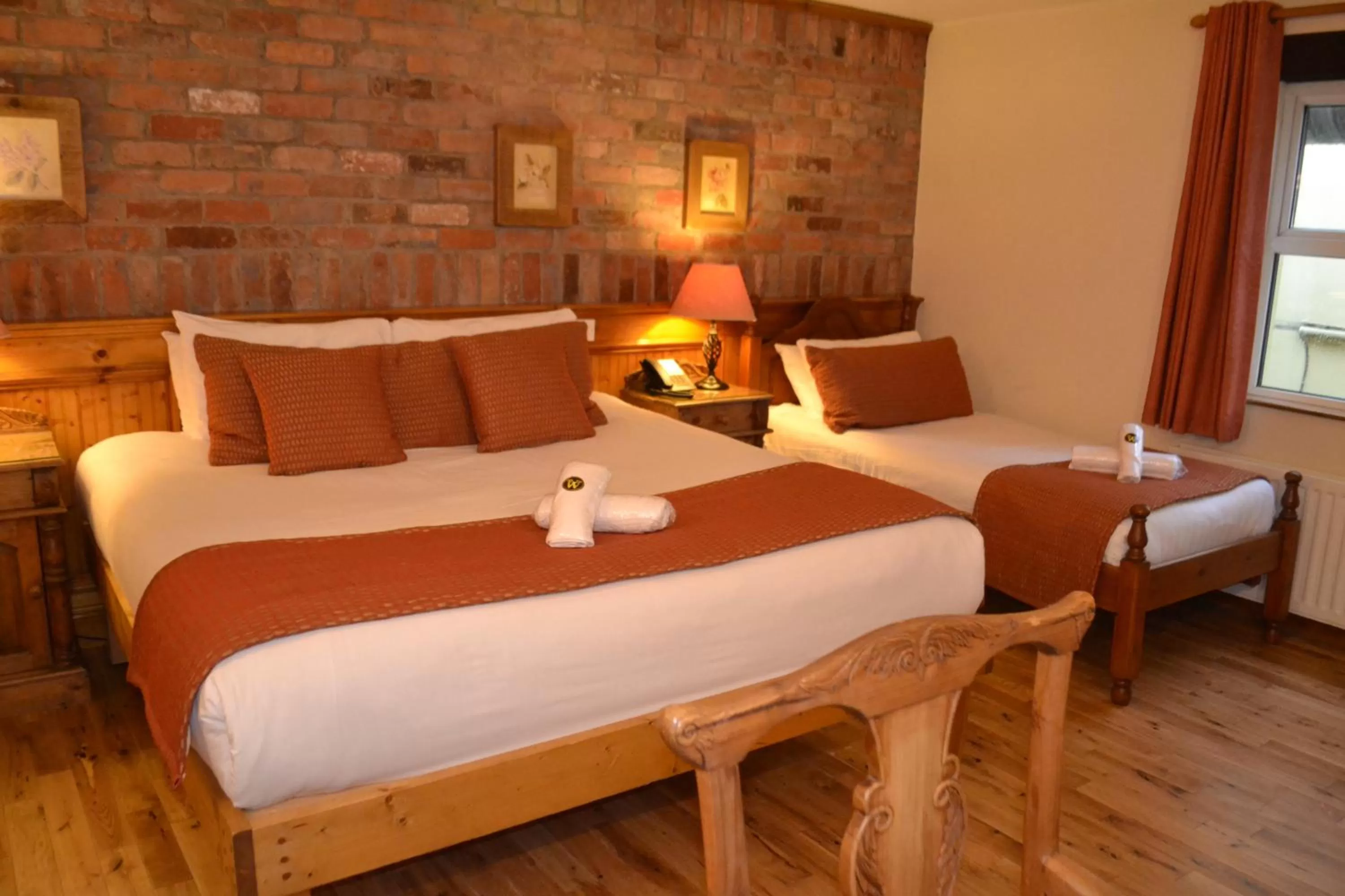 Bed in Walsh's Hotel and Apartments