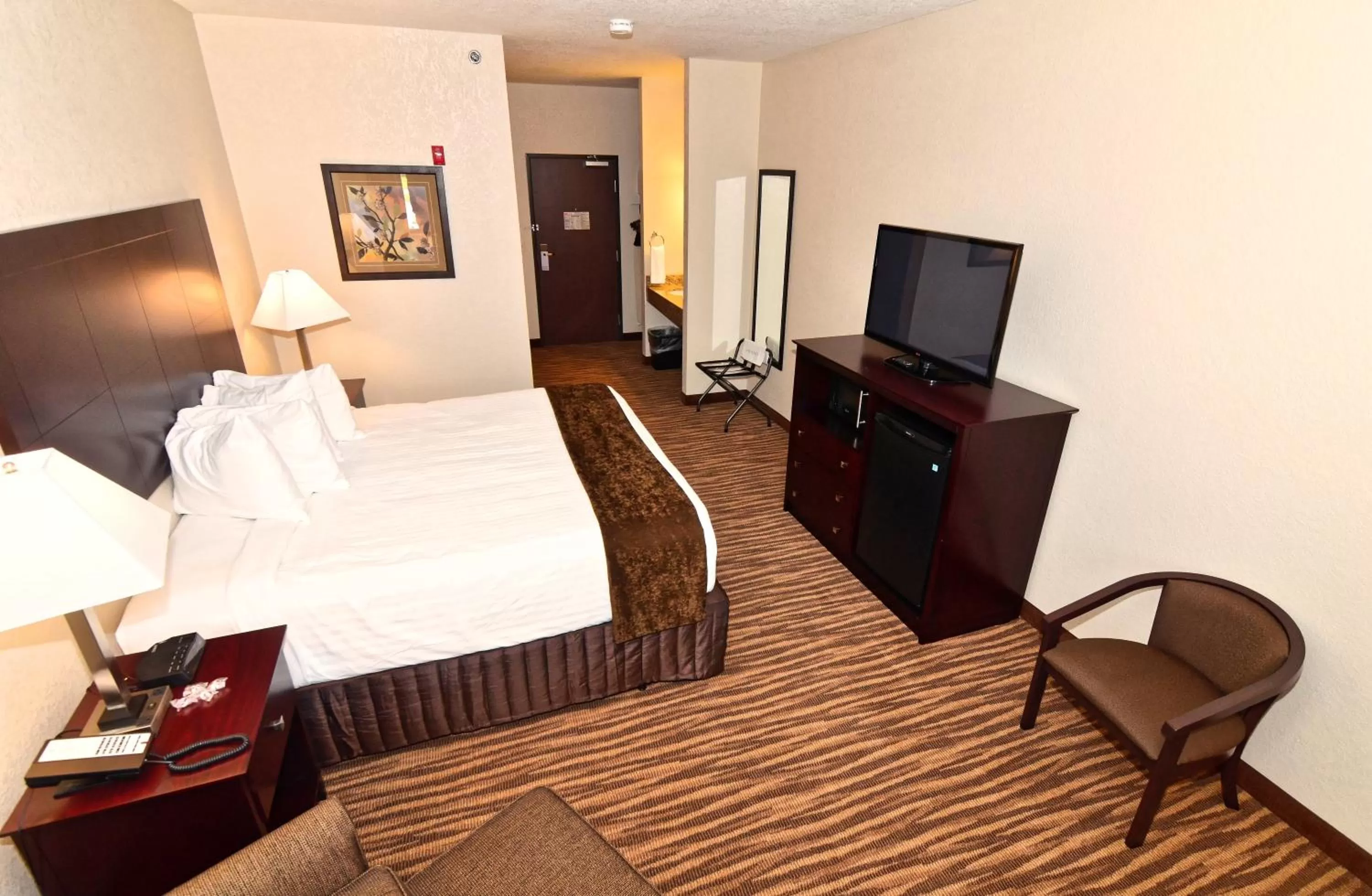 Bed in Cobblestone Inn & Suites - Clarion