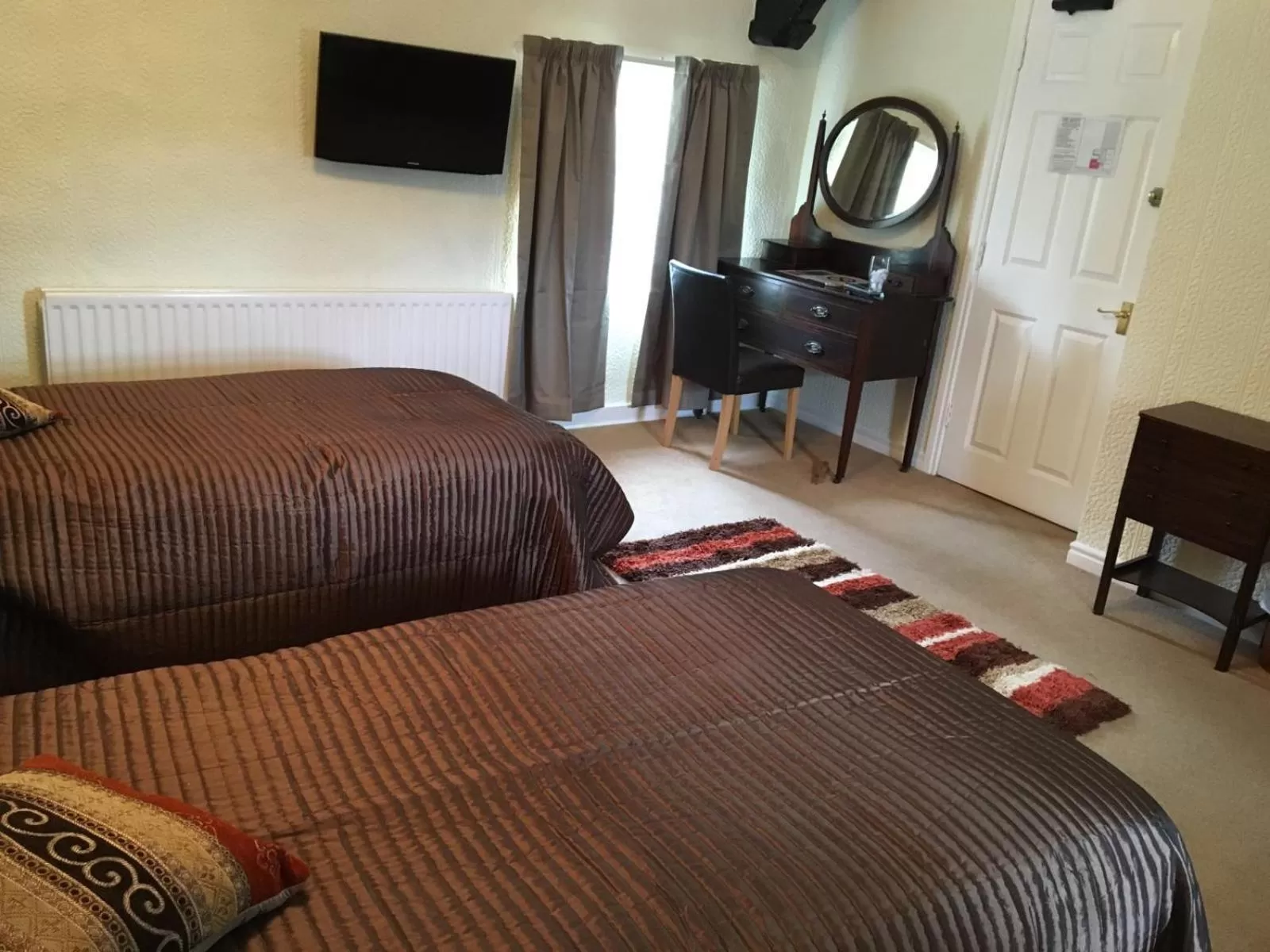 Bed in The Old Well Inn