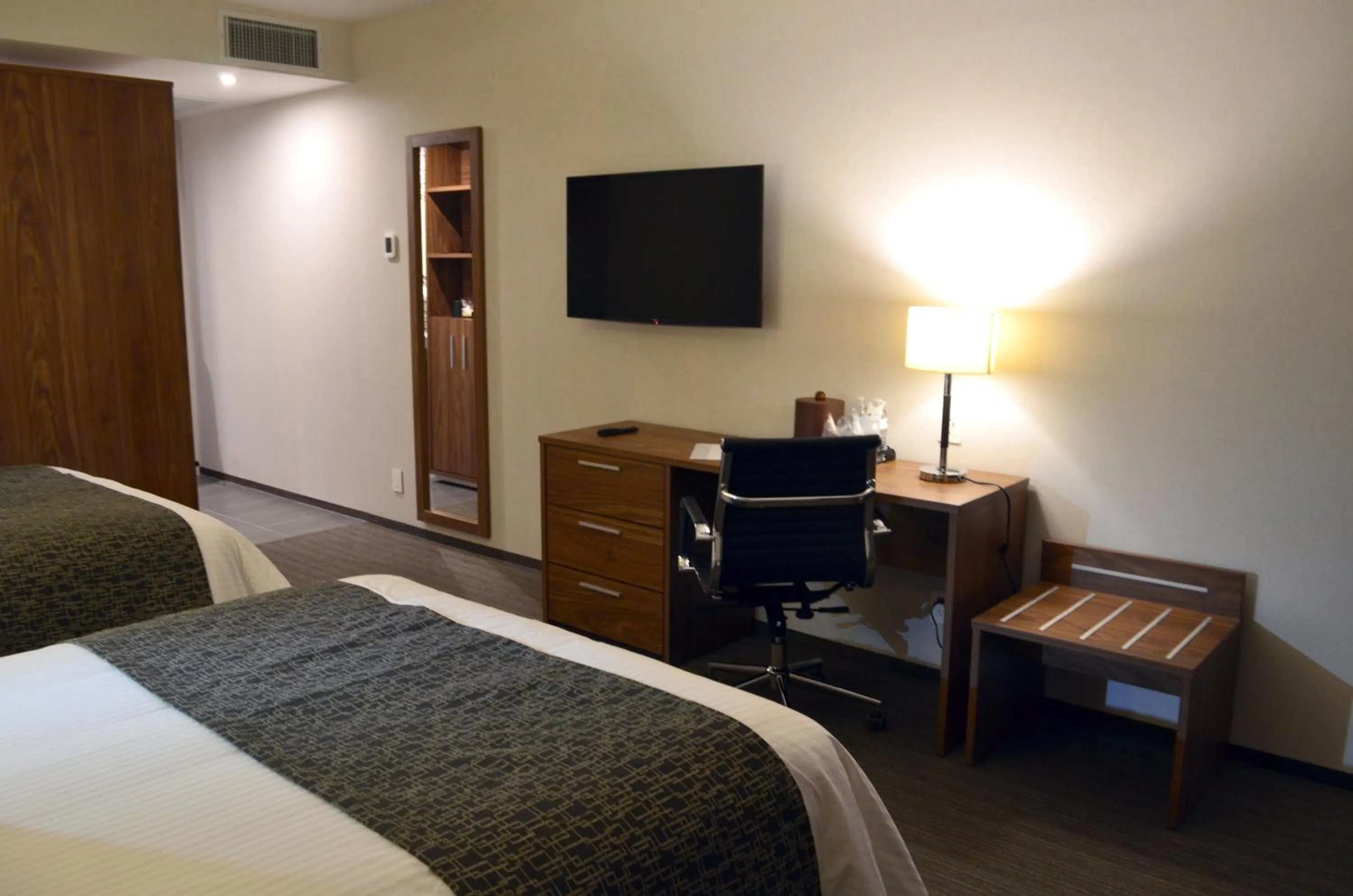 TV and multimedia, Bed in Casa Inn Business Irapuato