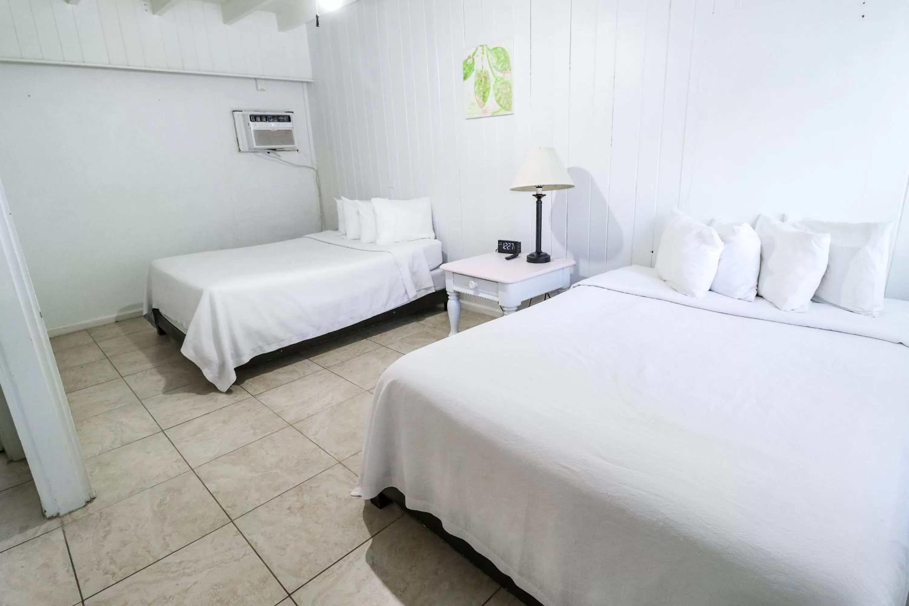 Bed in Drop Anchor Resort & Marina