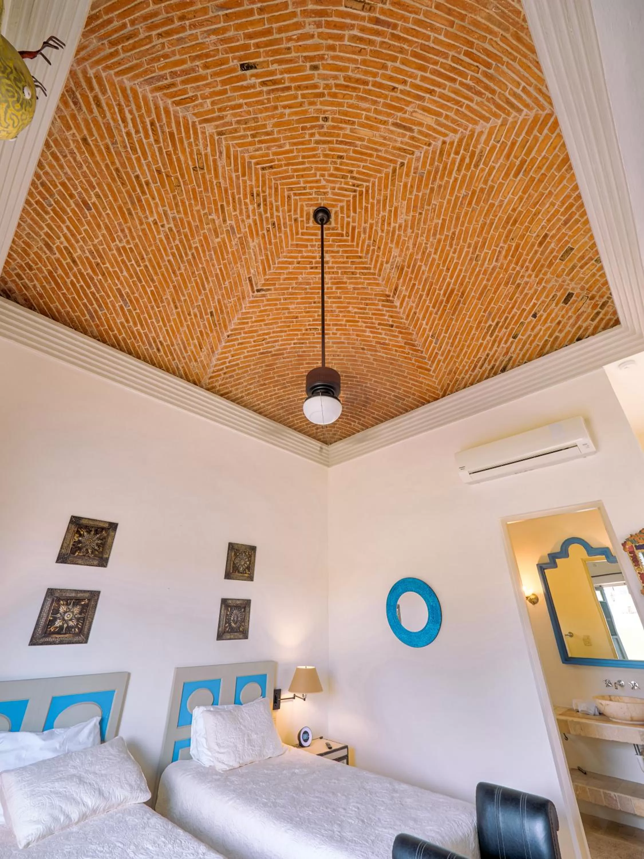 Bed in Casona 66 Merida Boutique Hotel