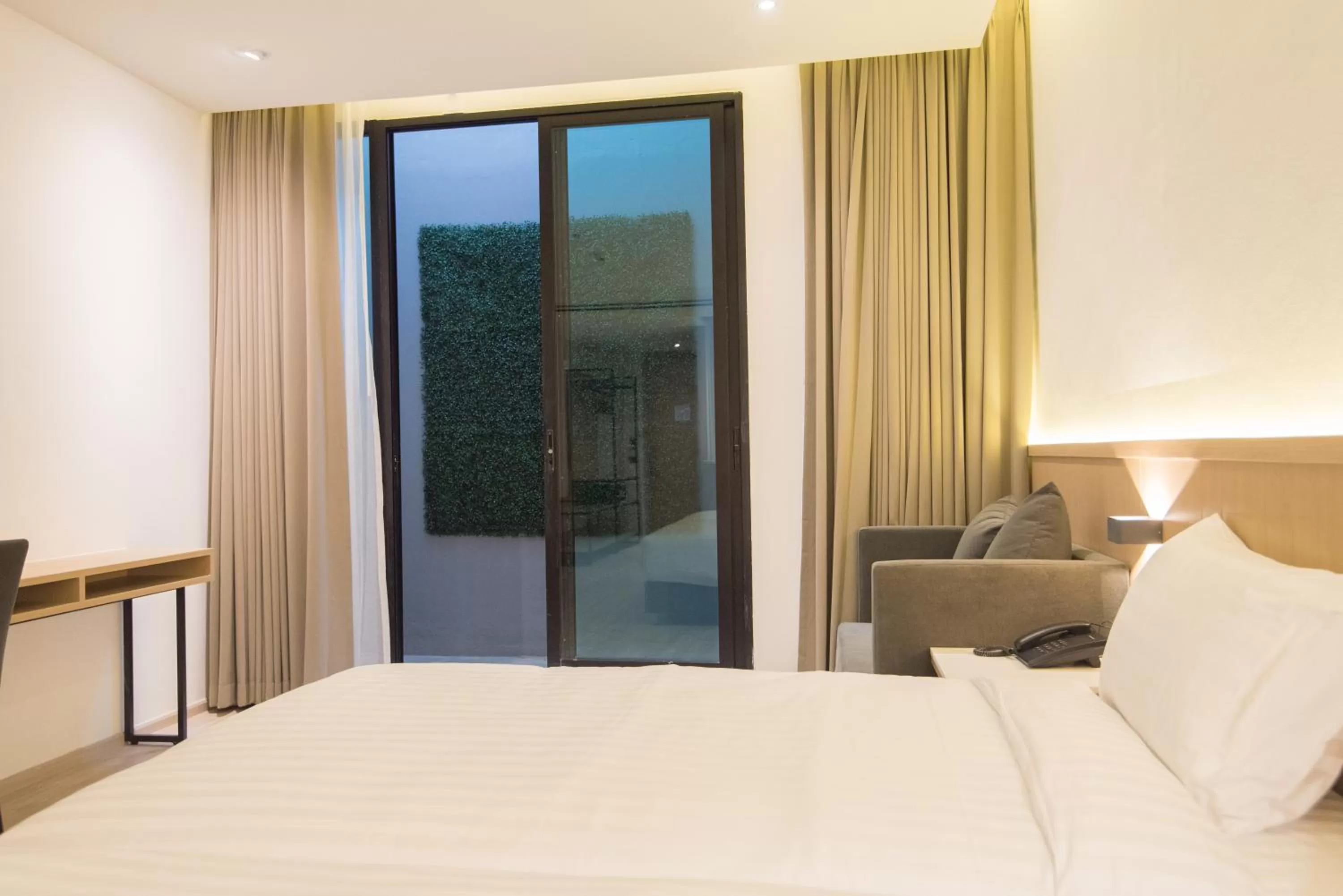 Bed in Madison Bangkok Hotel