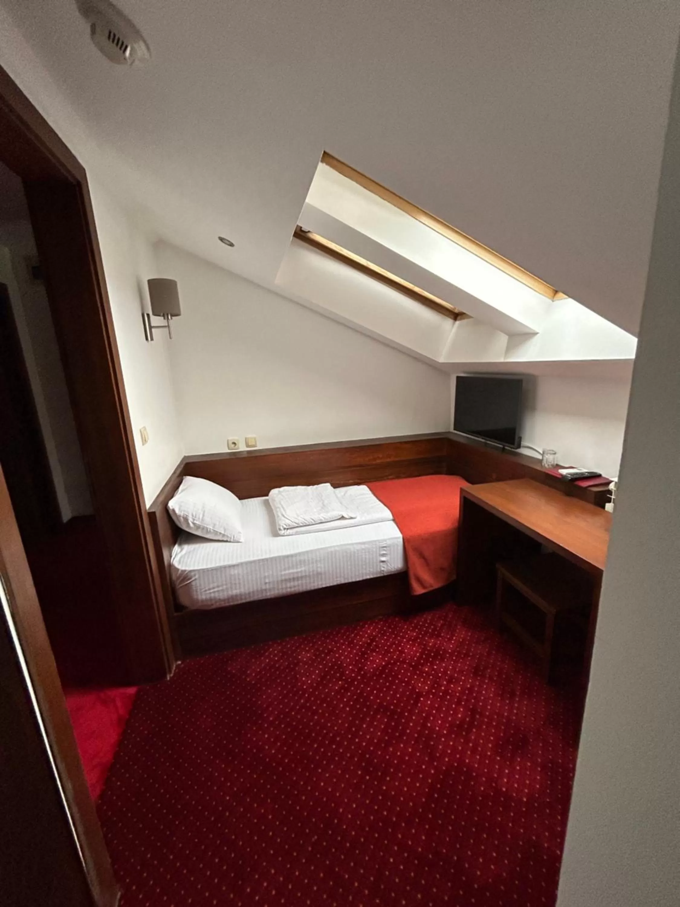 Bed in Garni Hotel Konak