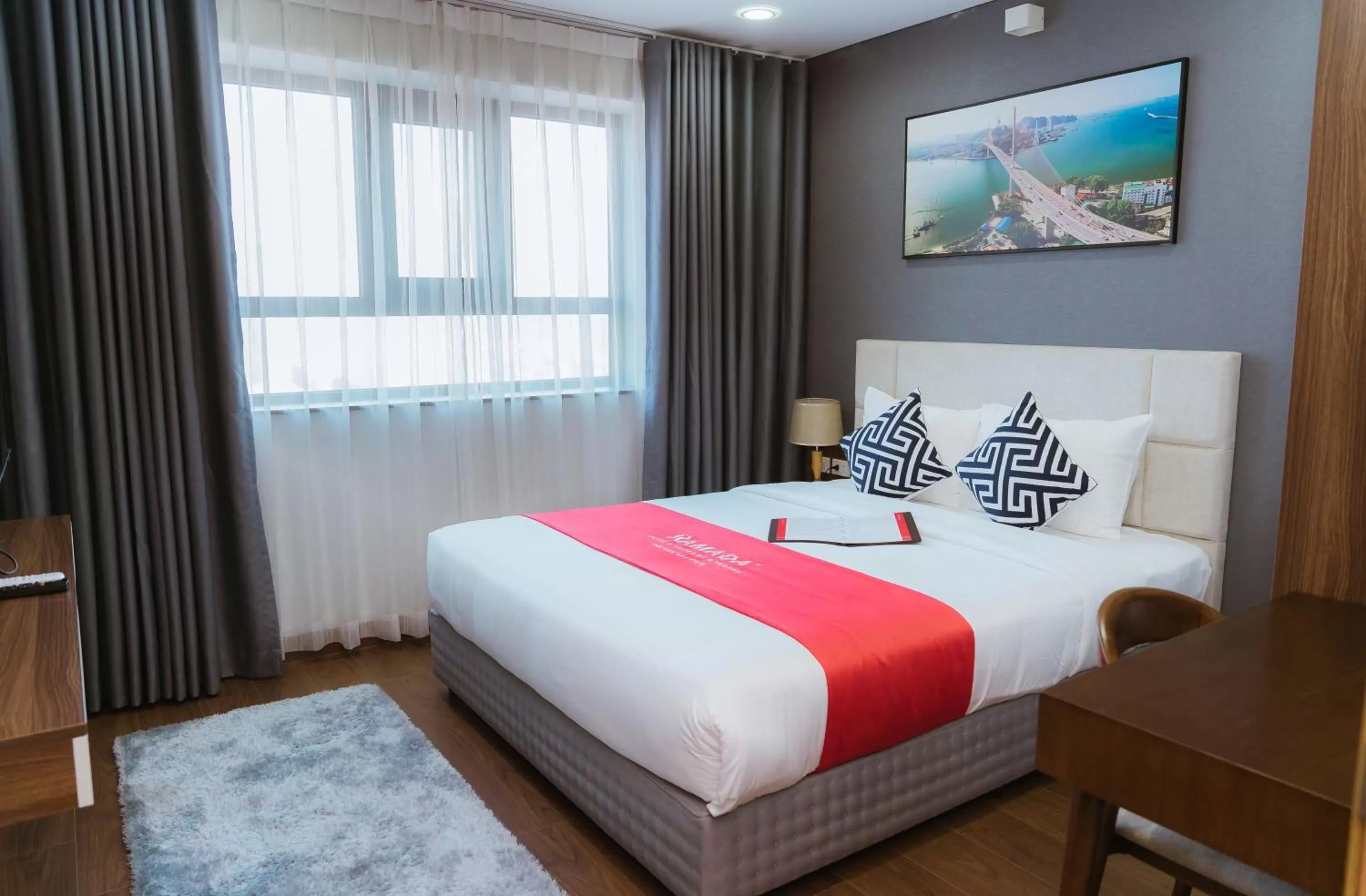 Bed in Ramada Hotel & Suites by Wyndham Halong Bay View
