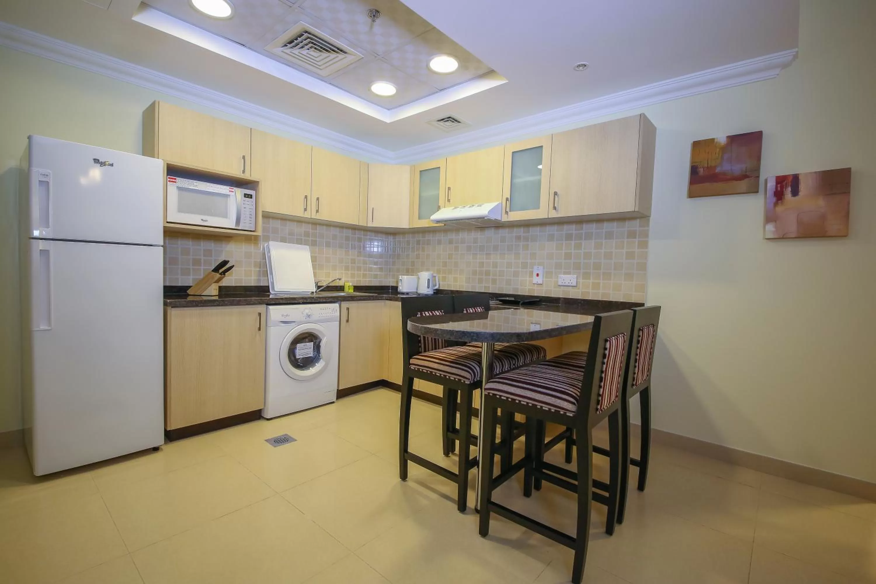 Kitchen or kitchenette in Ivory Grand Hotel Apartments