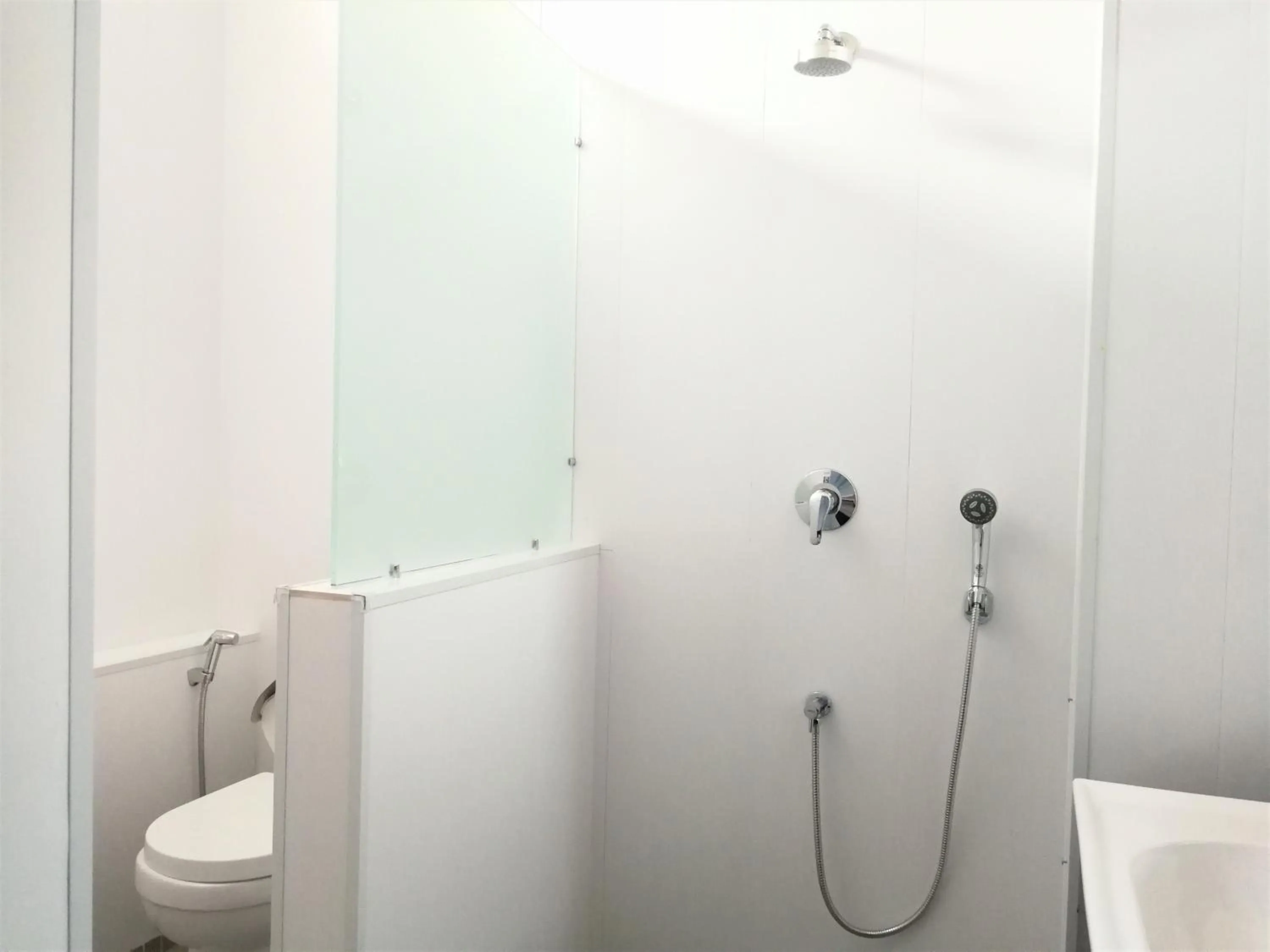 Shower in YAMA HOTEL & ROOFTOP BAR