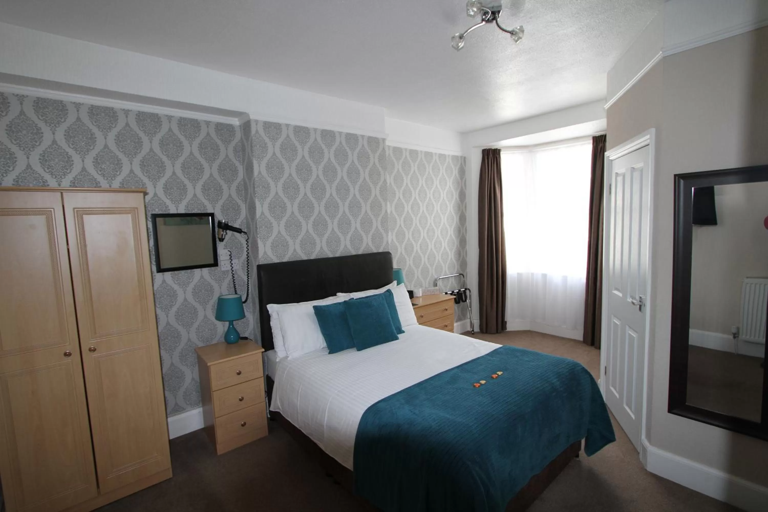 Bed in Cranmore Guest House