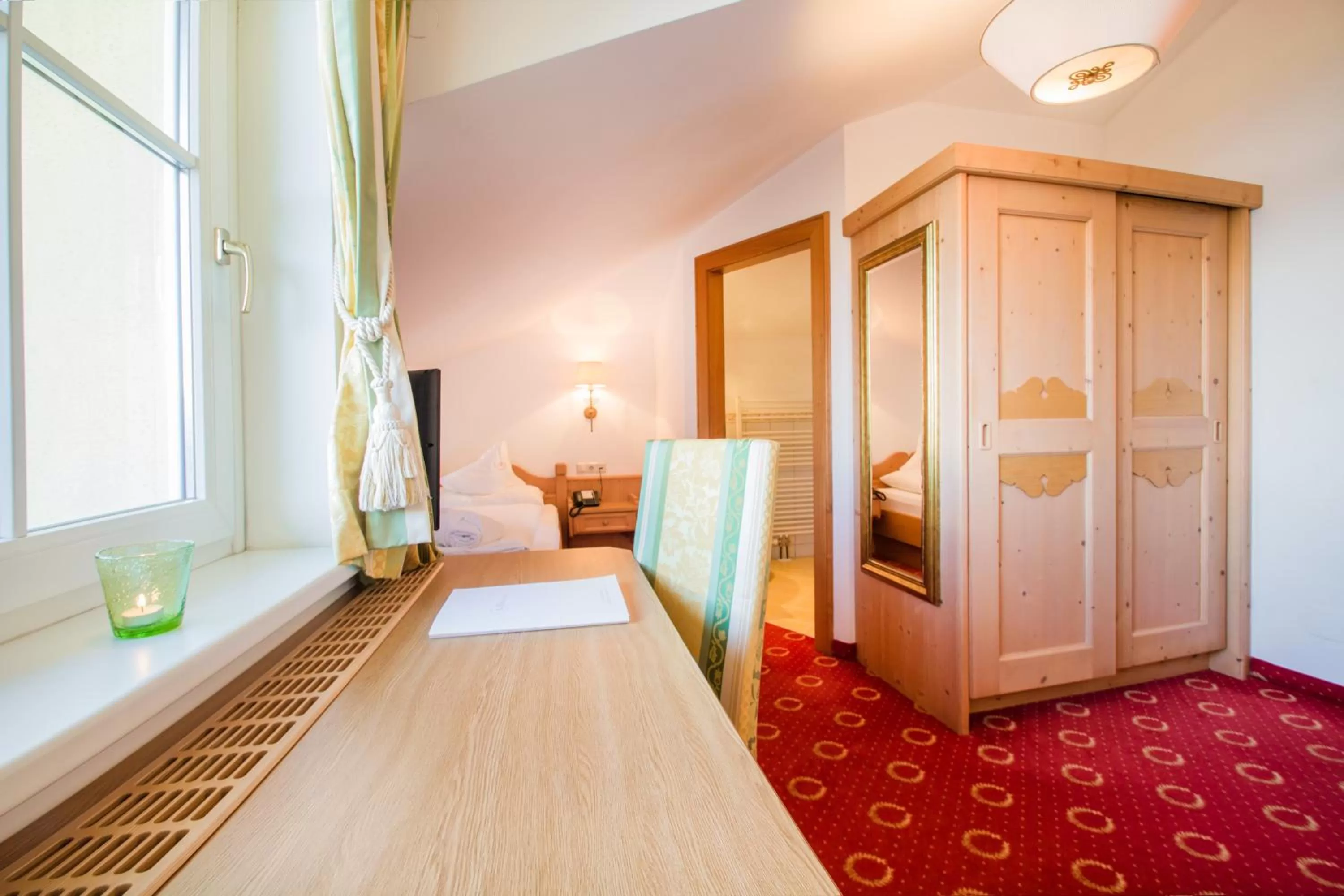 Photo of the whole room, Bed in Hotel AlpenSchlössl