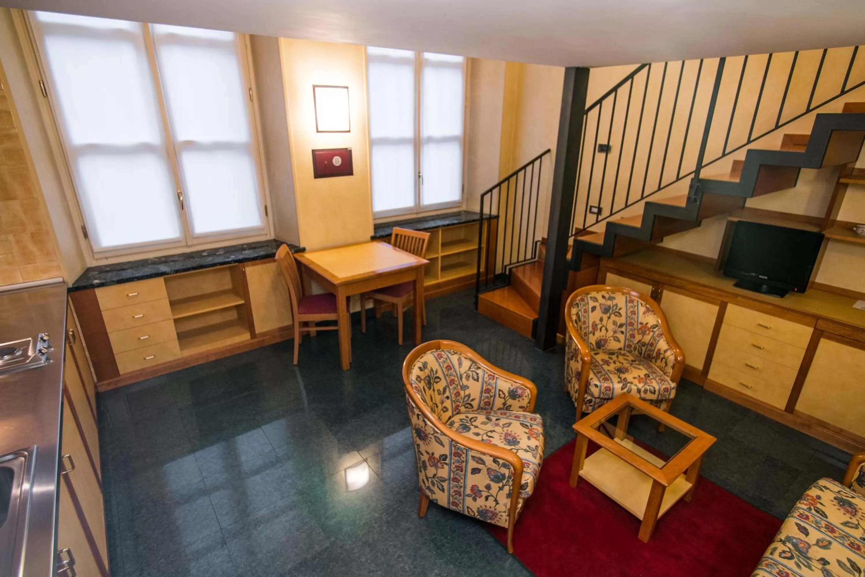 Dining area in Le Petit Hotel