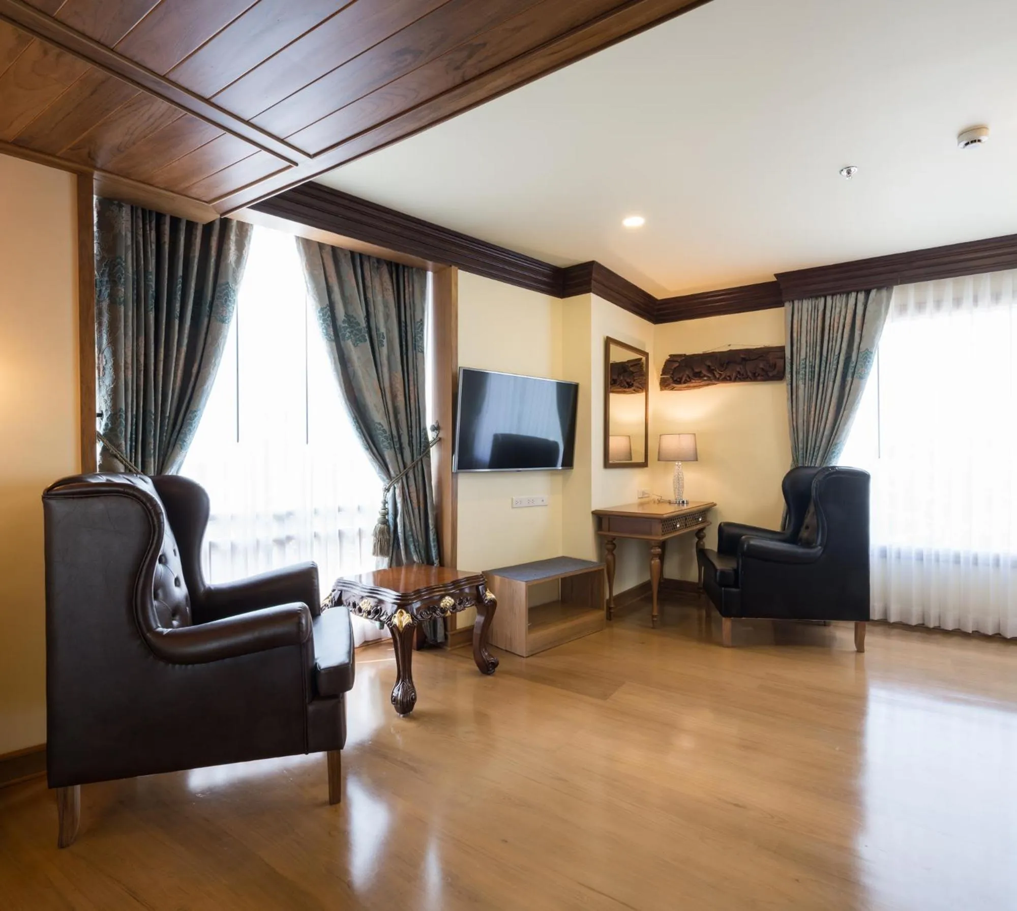 Living room in Peak Nimman Prestige Hotel