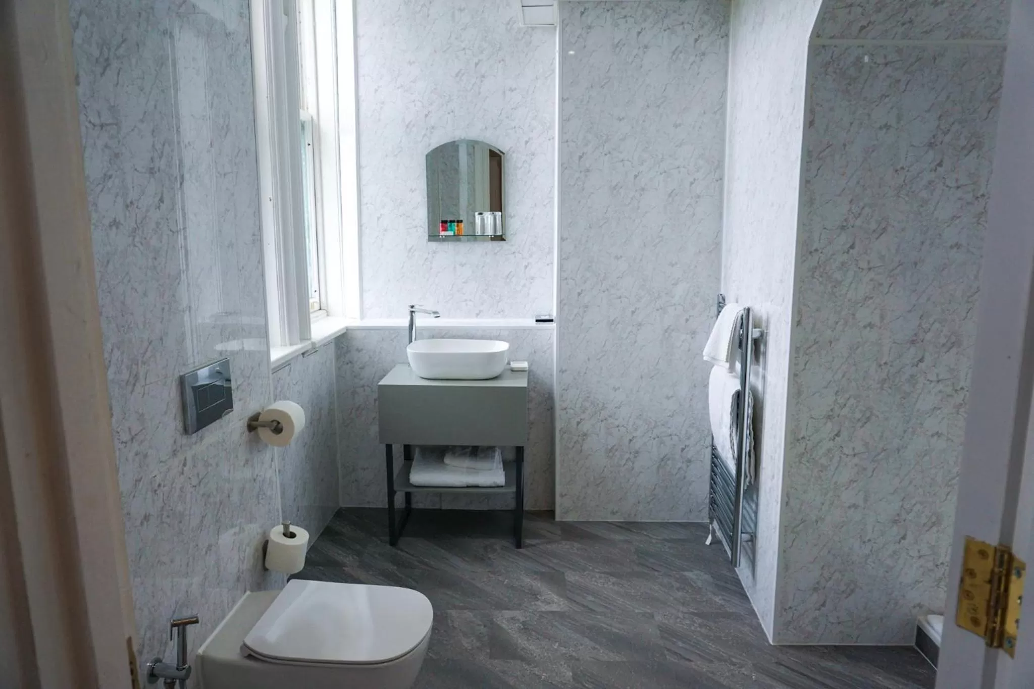 Bathroom in Wroxall Abbey Hotel