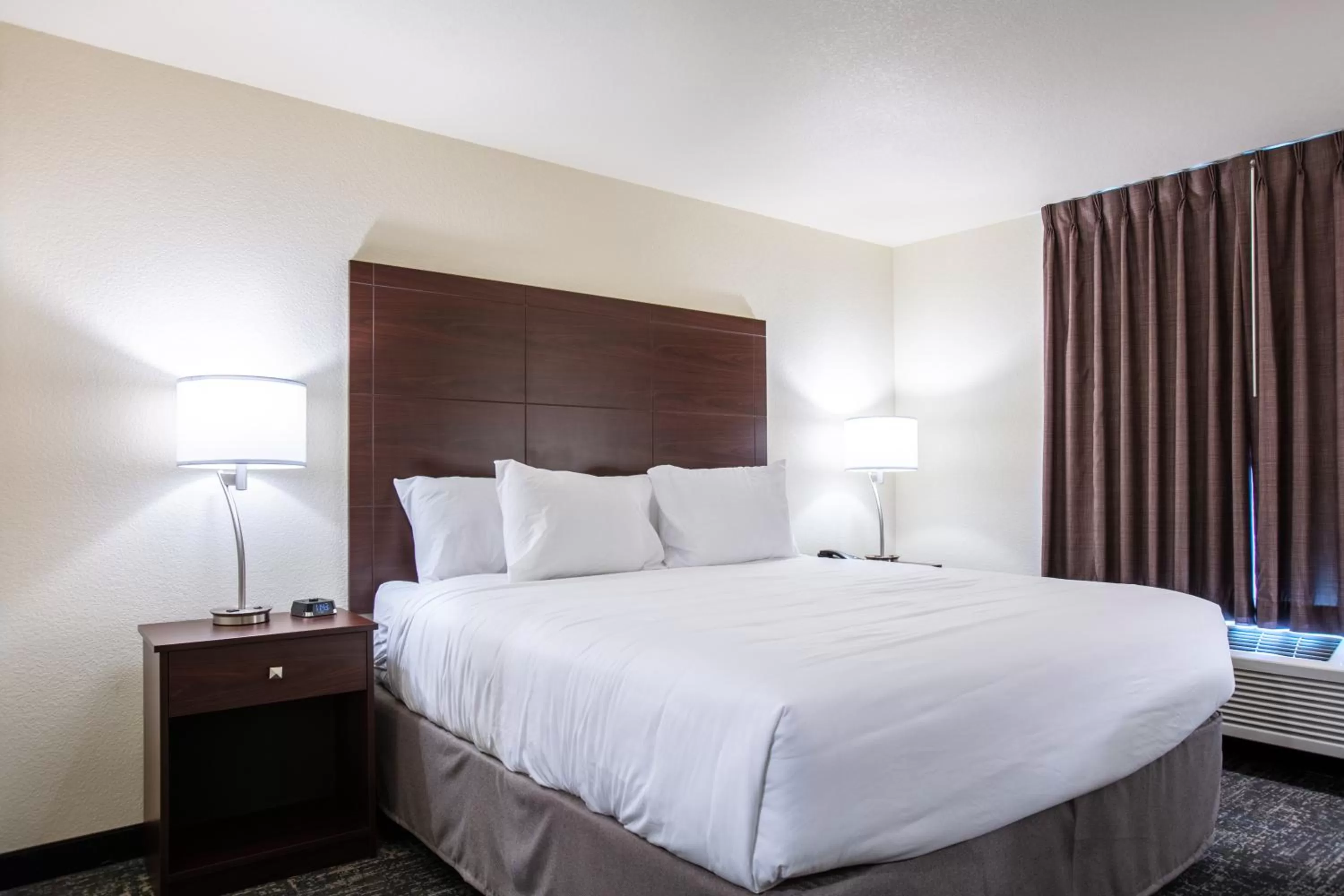 Bed in Cobblestone Inn & Suites - Pine Bluffs