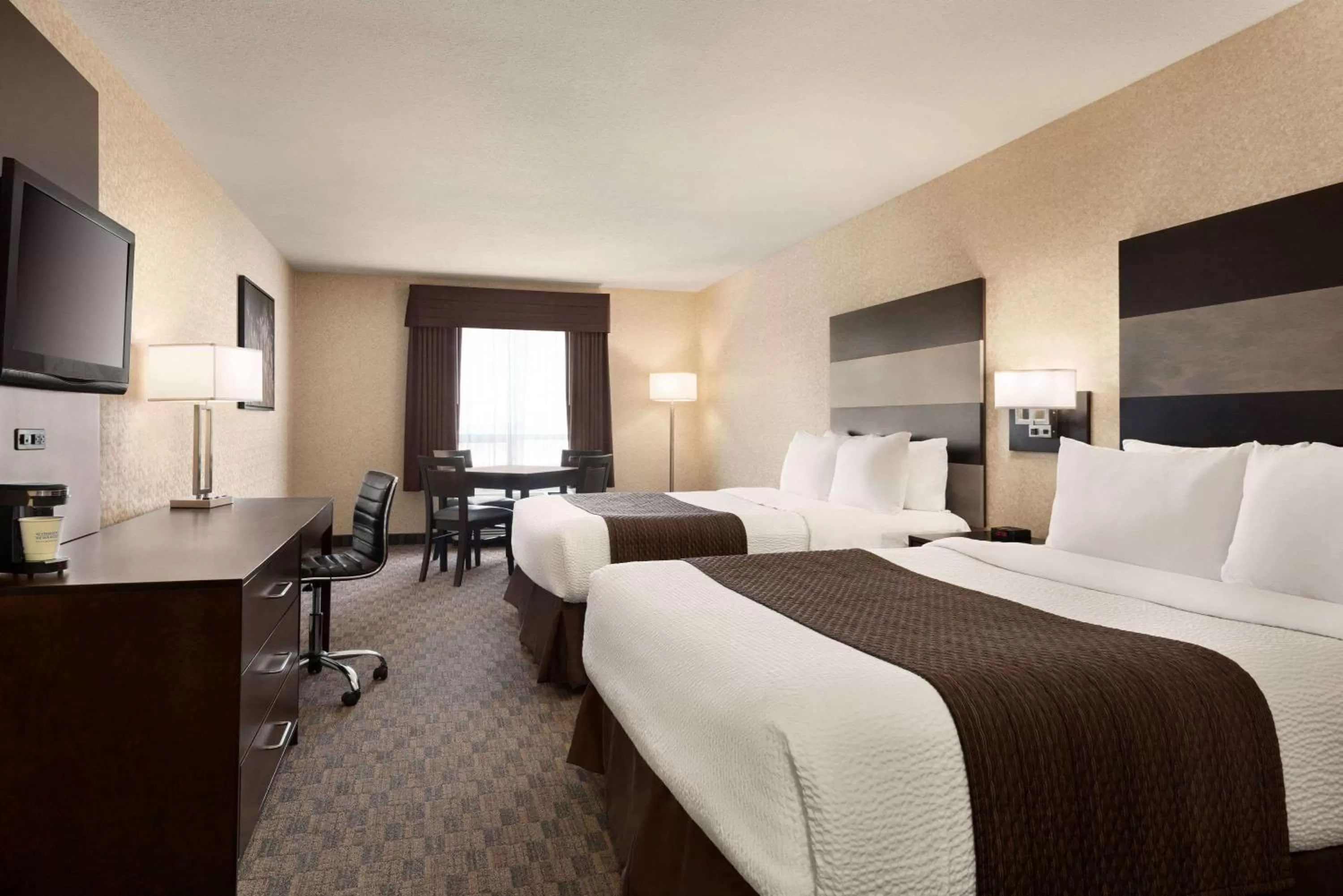 Photo of the whole room, Bed in Days Inn by Wyndham Saskatoon