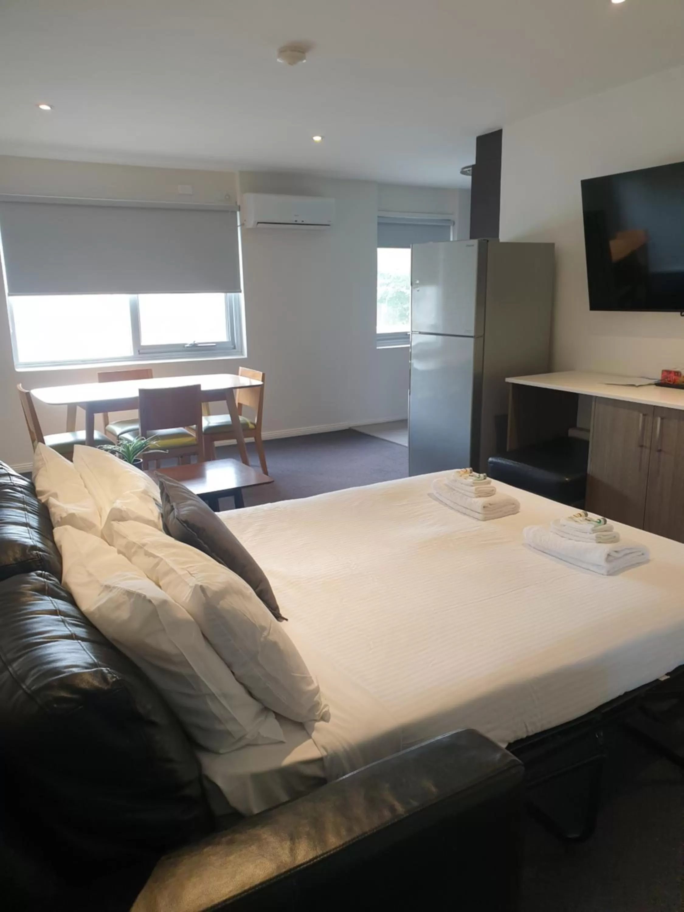 Bed in Carlton Suites