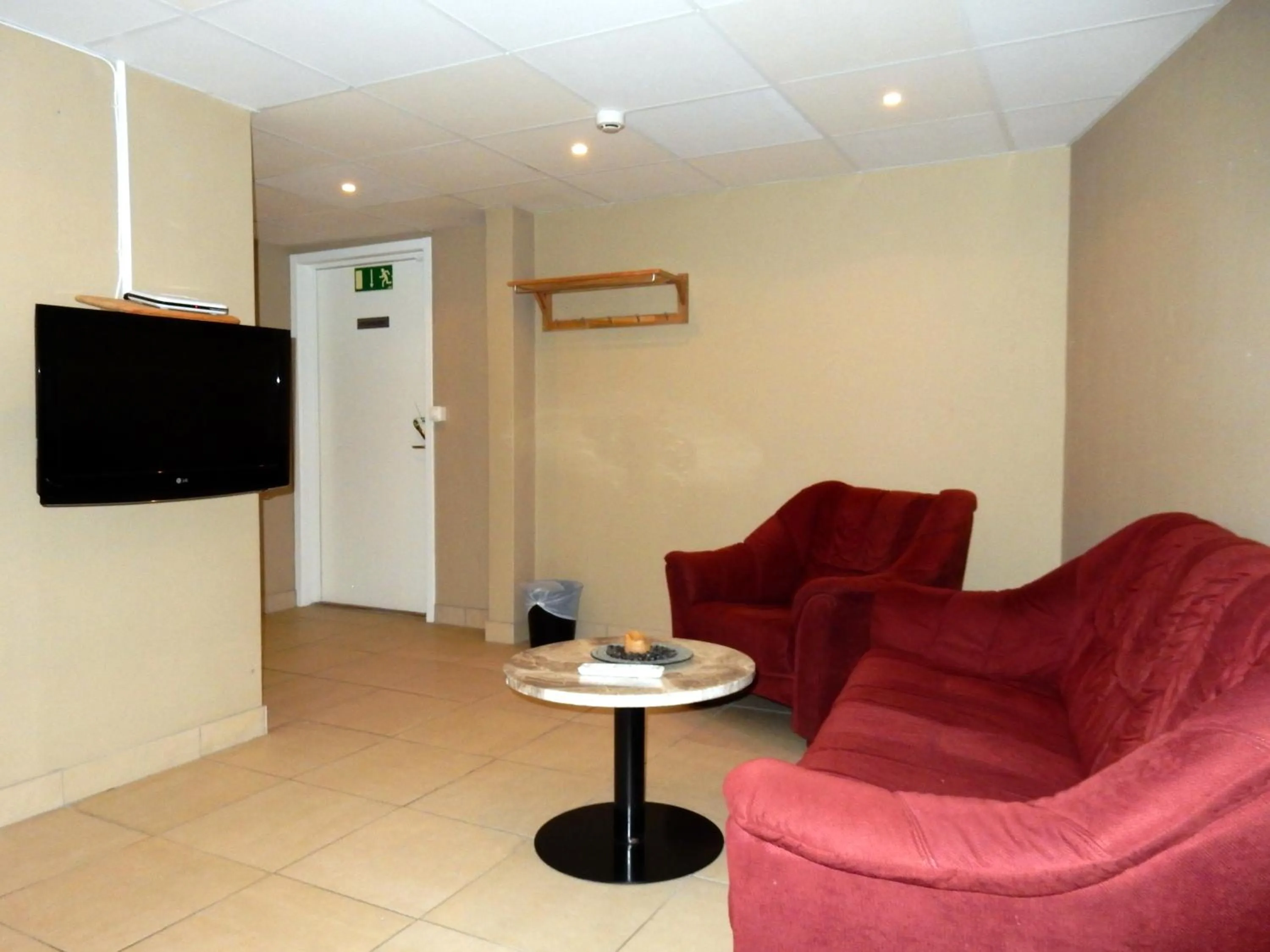 Communal lounge/ TV room in Grand Hotell Bollnäs