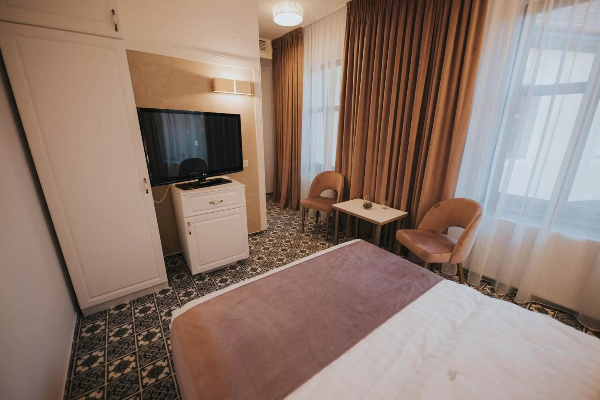 Photo of the whole room, TV/Entertainment Center in Hotel Marabella