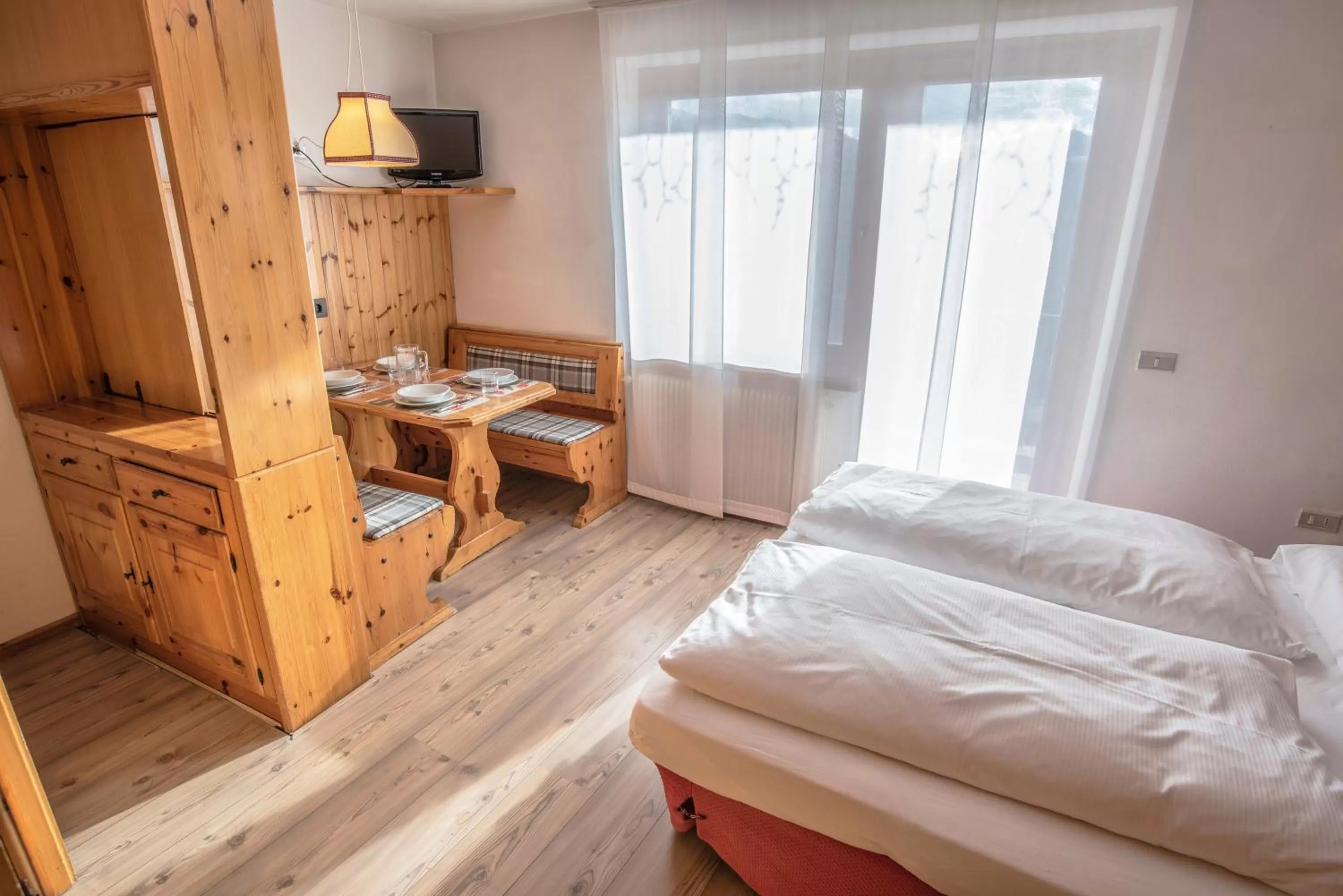 Living room, Bed in Hotel Resort Veronza