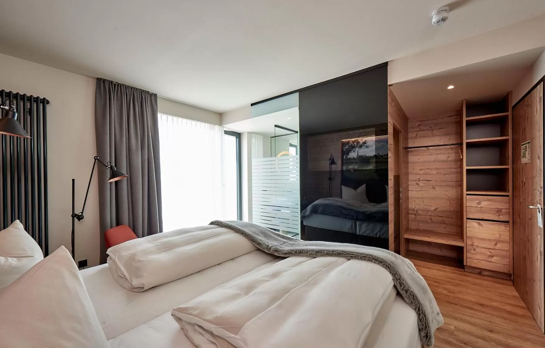 Photo of the whole room, Bed in Genusshotel Wenisch