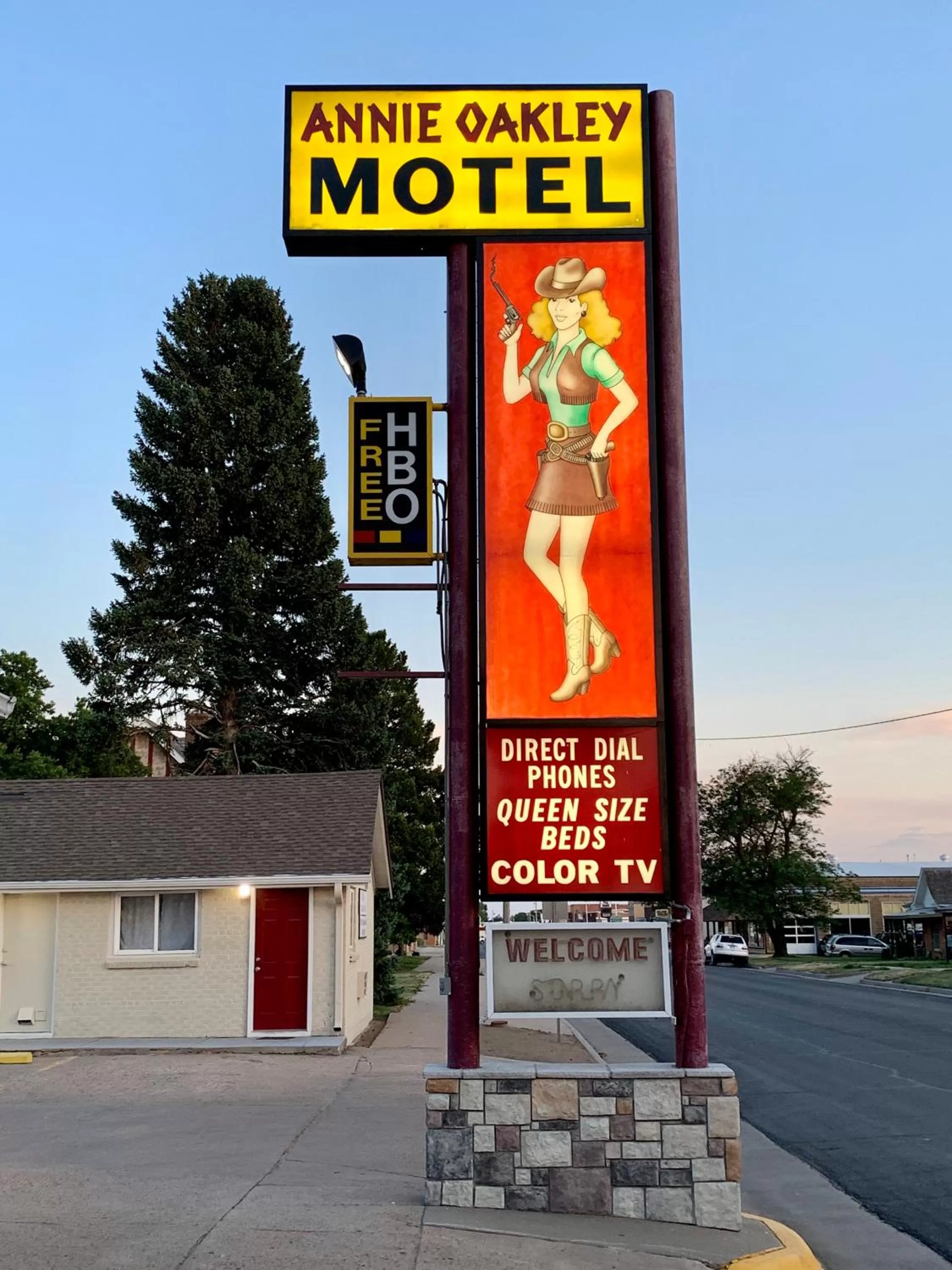 Property logo or sign in Annie Oakley Motel Oakley