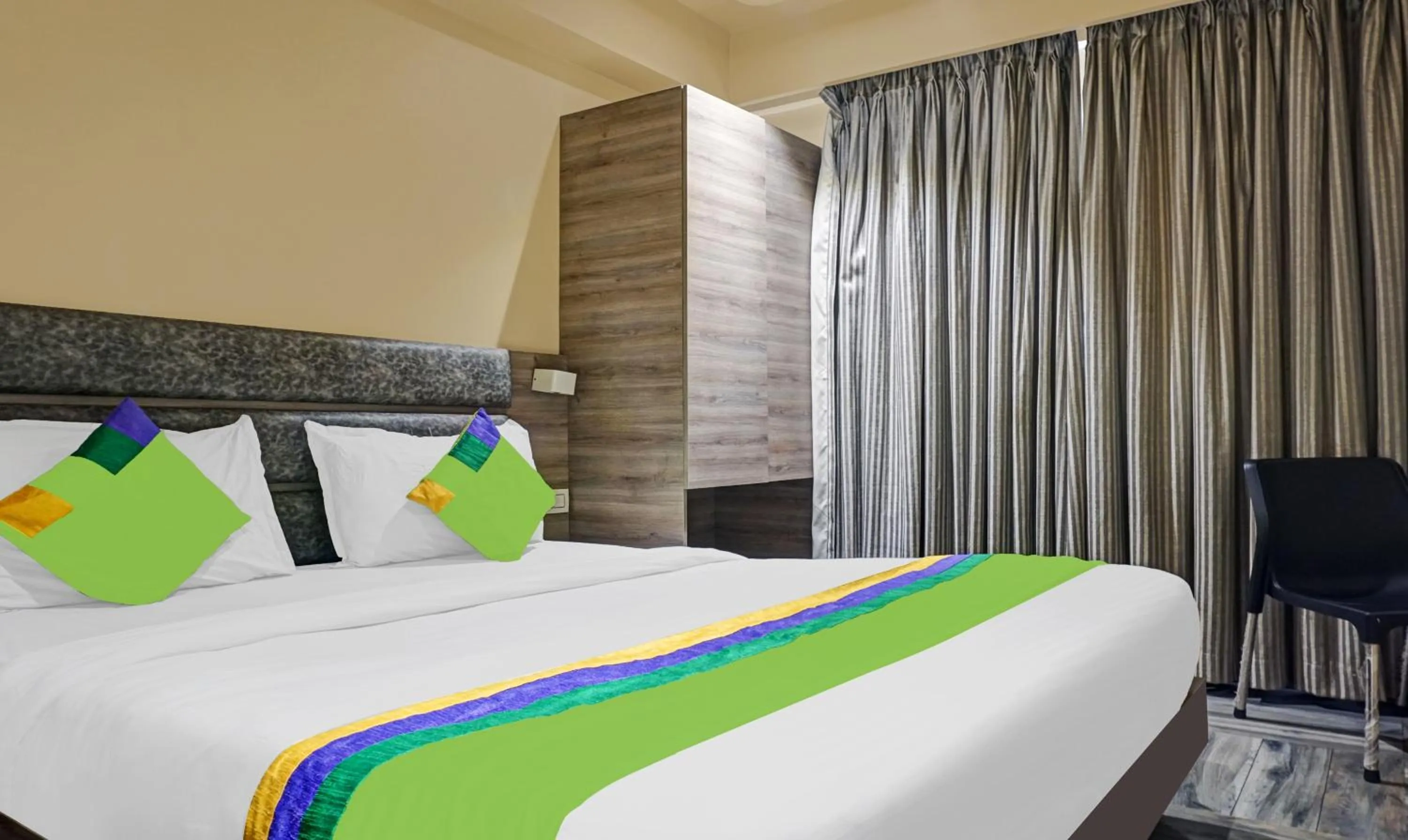 Bedroom, Bed in Treebo Classic Grande, Camp