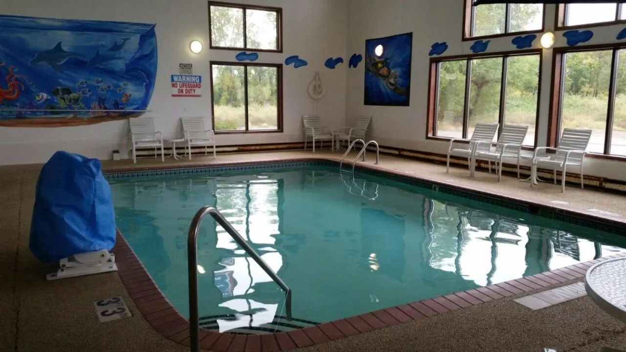 Swimming pool in AmericInn by Wyndham Forest Lake