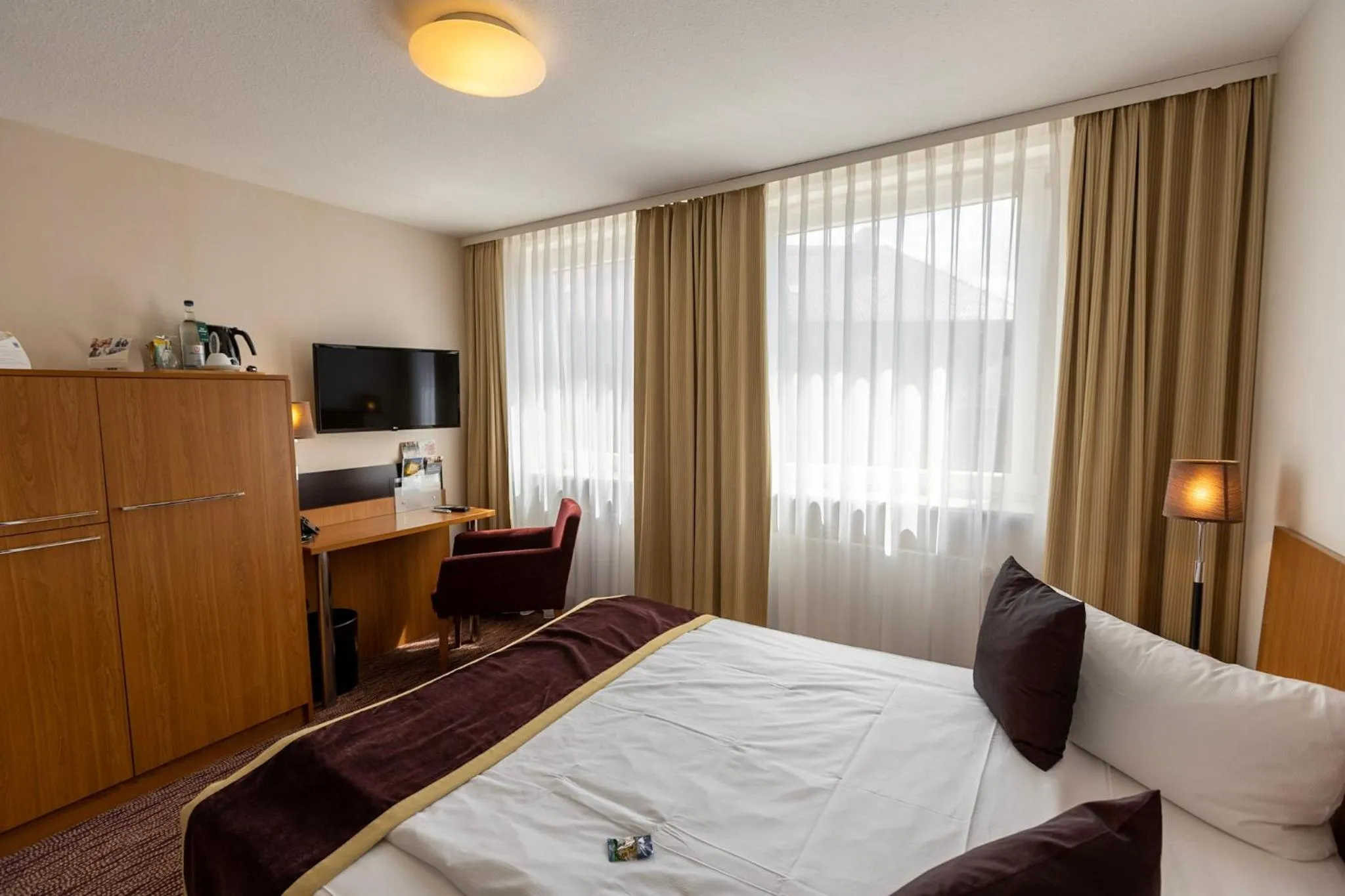 Photo of the whole room, Bed in Comfort Hotel tom Kyle