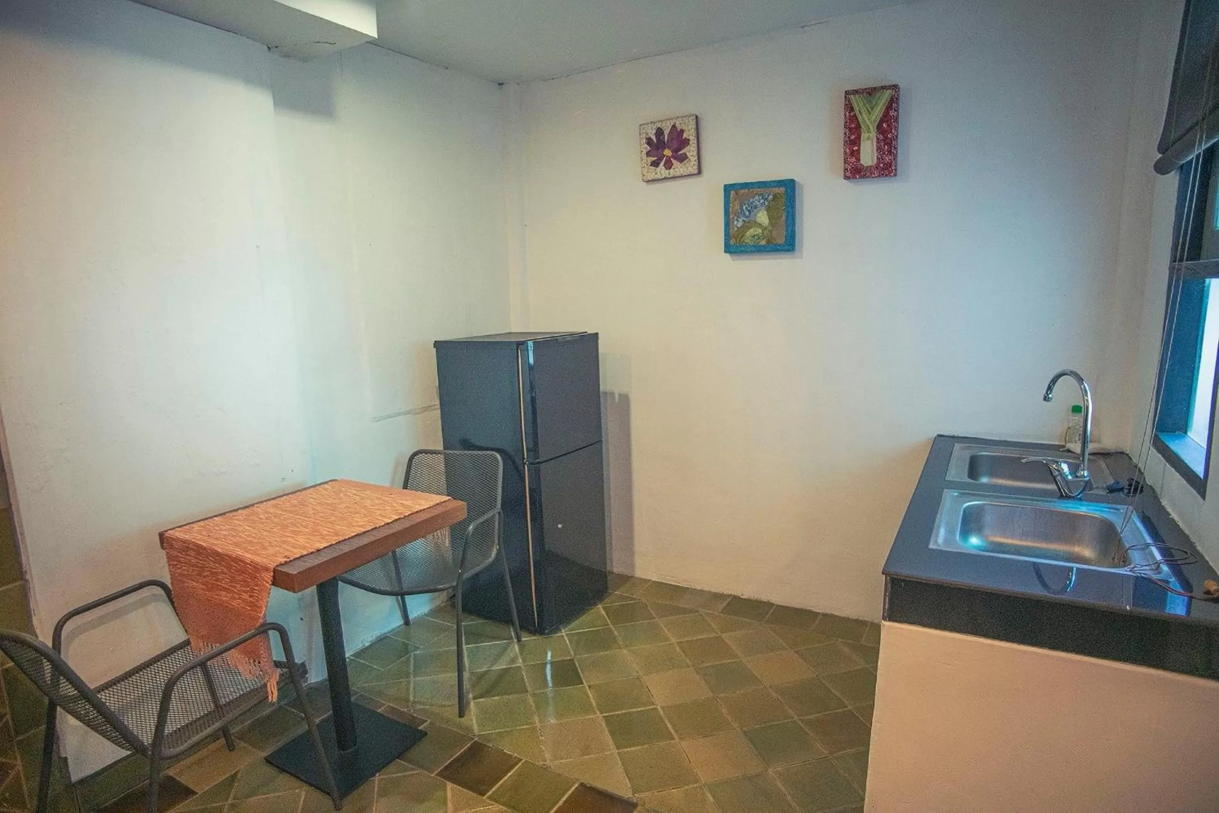 Kitchen or kitchenette in Baan Suan Residence เฮือนพักบ้านสวน