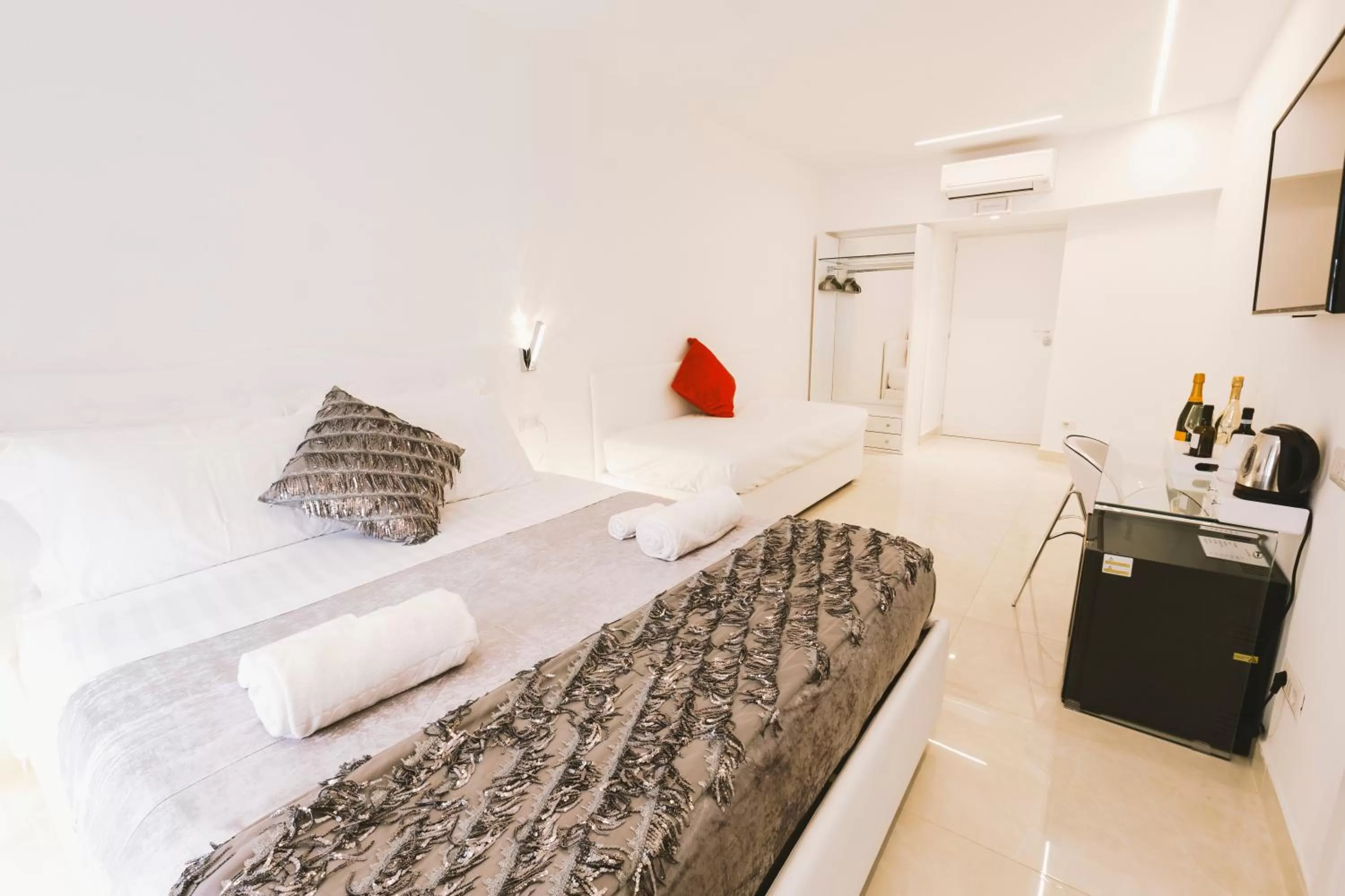 Bed in San Pietro Grand Suite