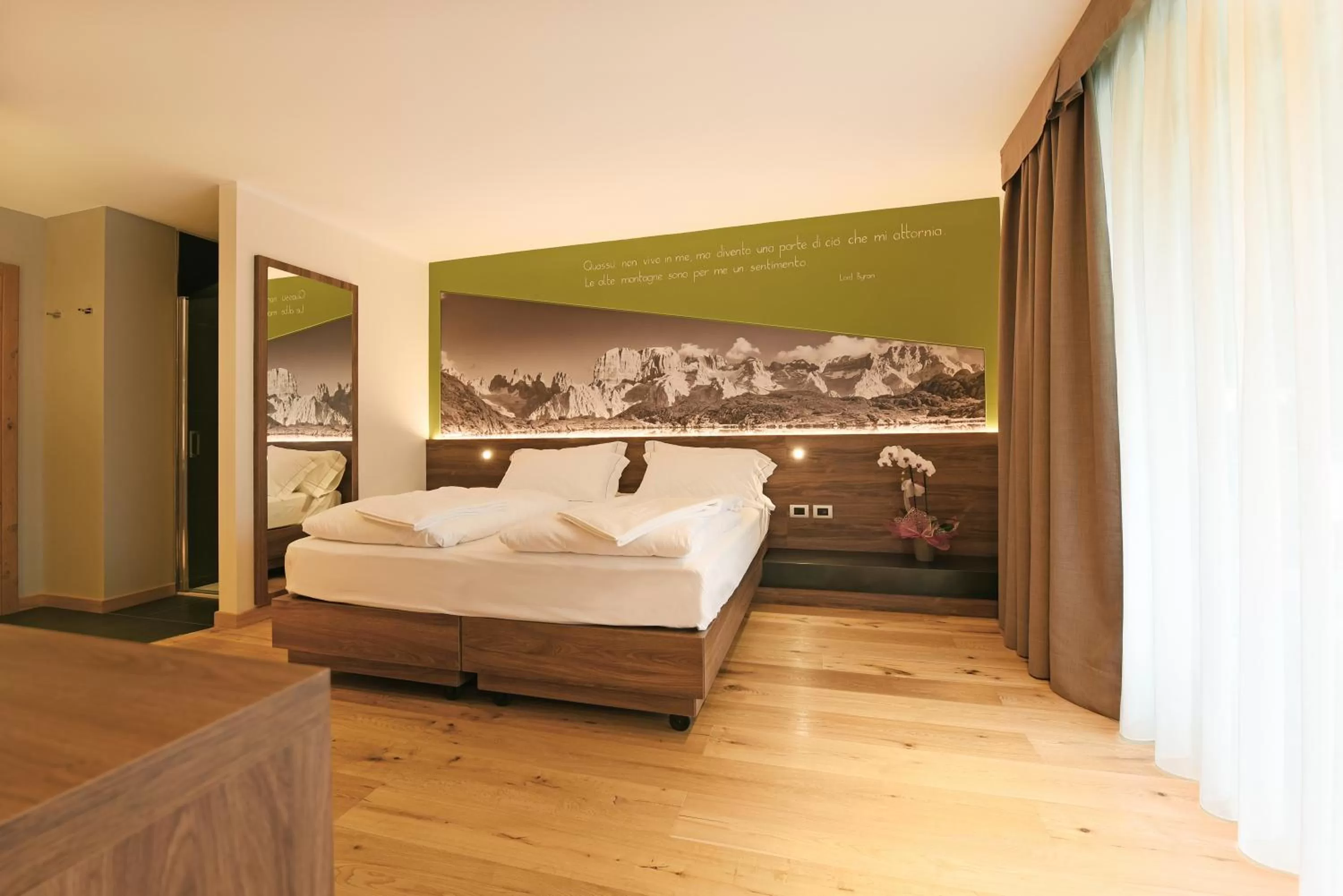 Bed in Dolomeet Boutique Hotel