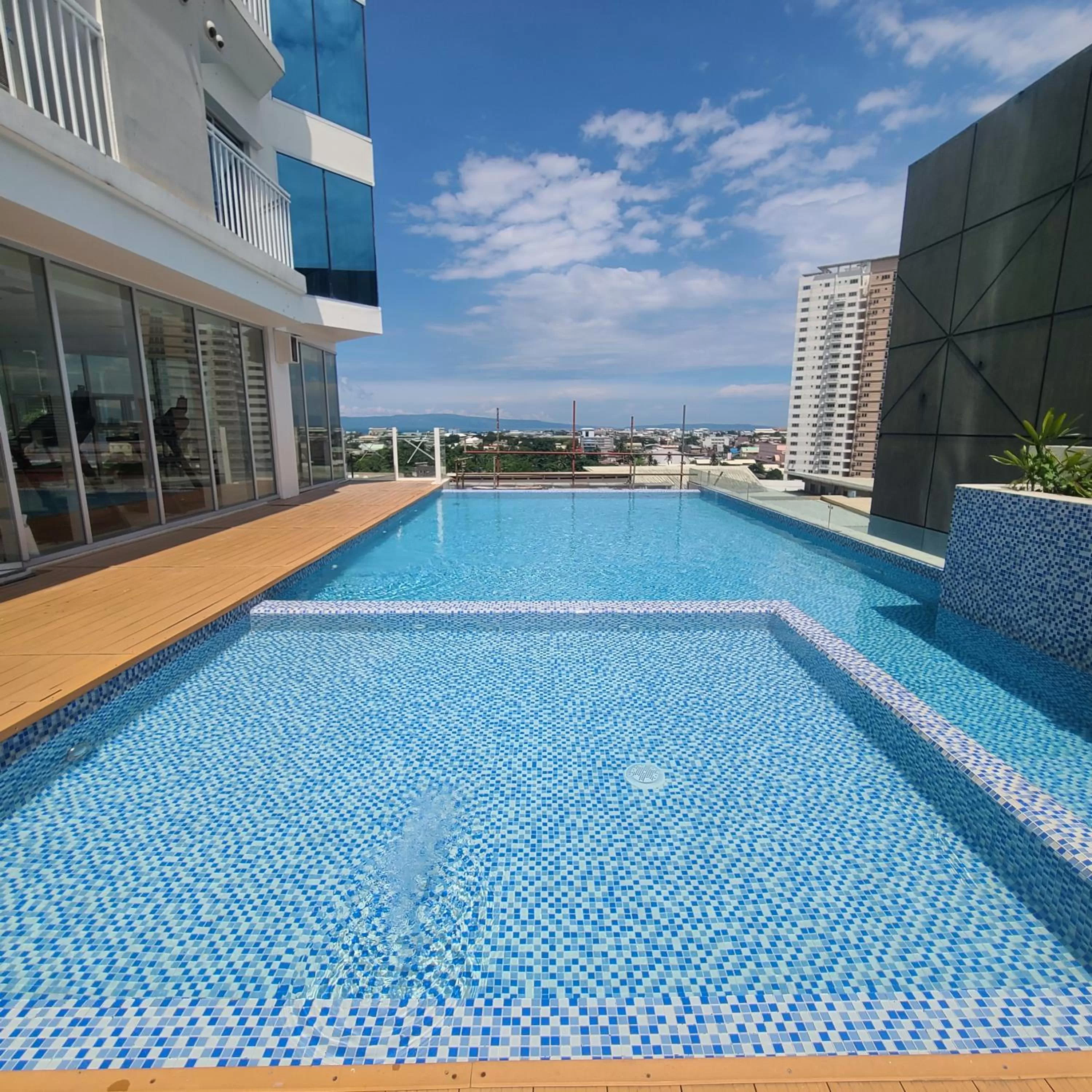 Swimming pool in INSPIRIA Condo Free Airport Pickup for 3 nights stay or more