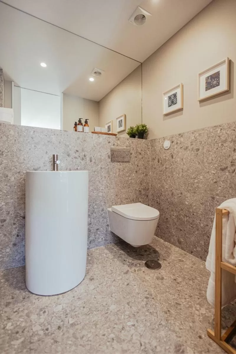 Bathroom in As Vizinhas Boutique Apartments