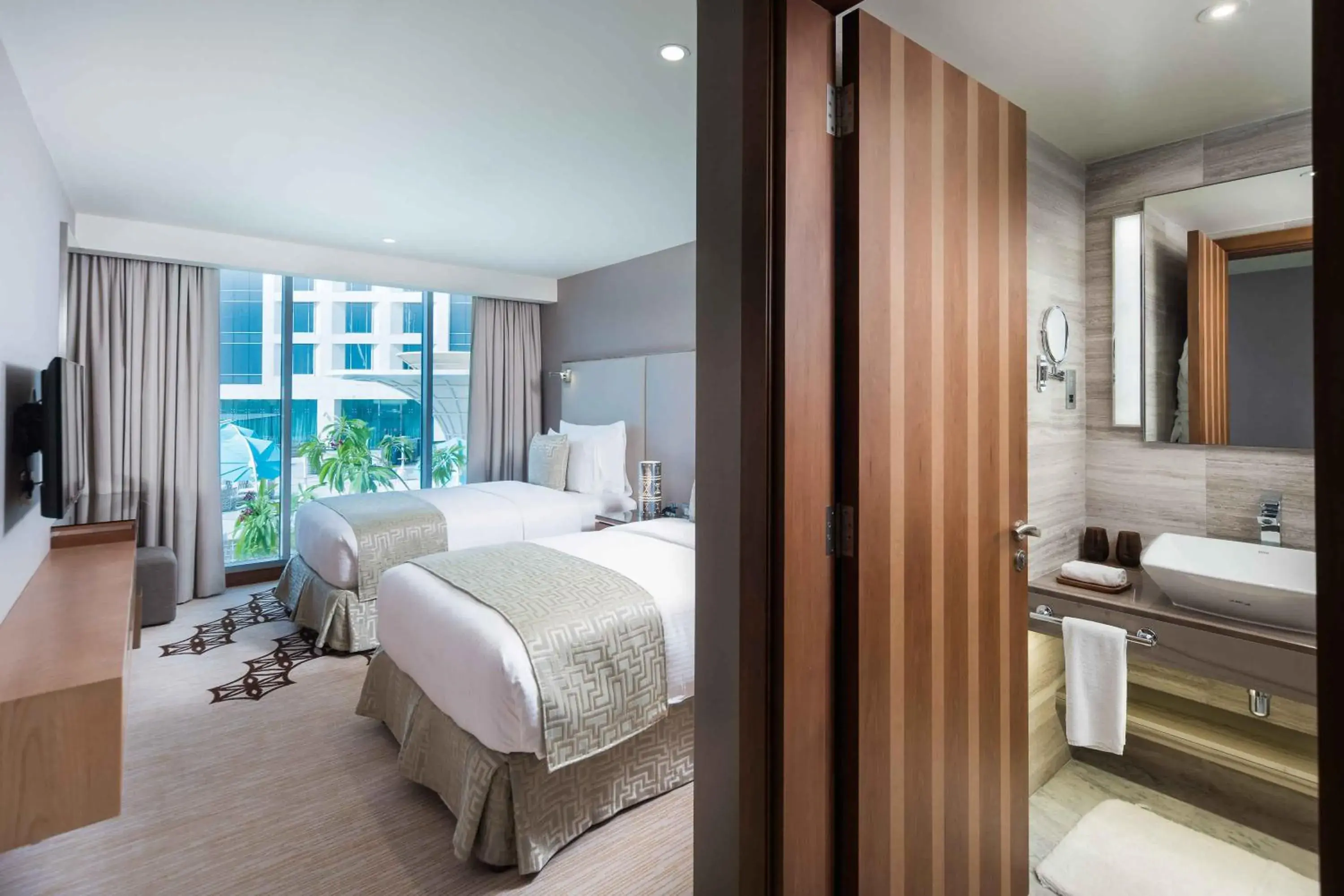 Club Twin Room with Executive Lounge Access in Grand Millennium Muscat Club Twin Room with Executive Lounge Access in Grand Millennium Muscat