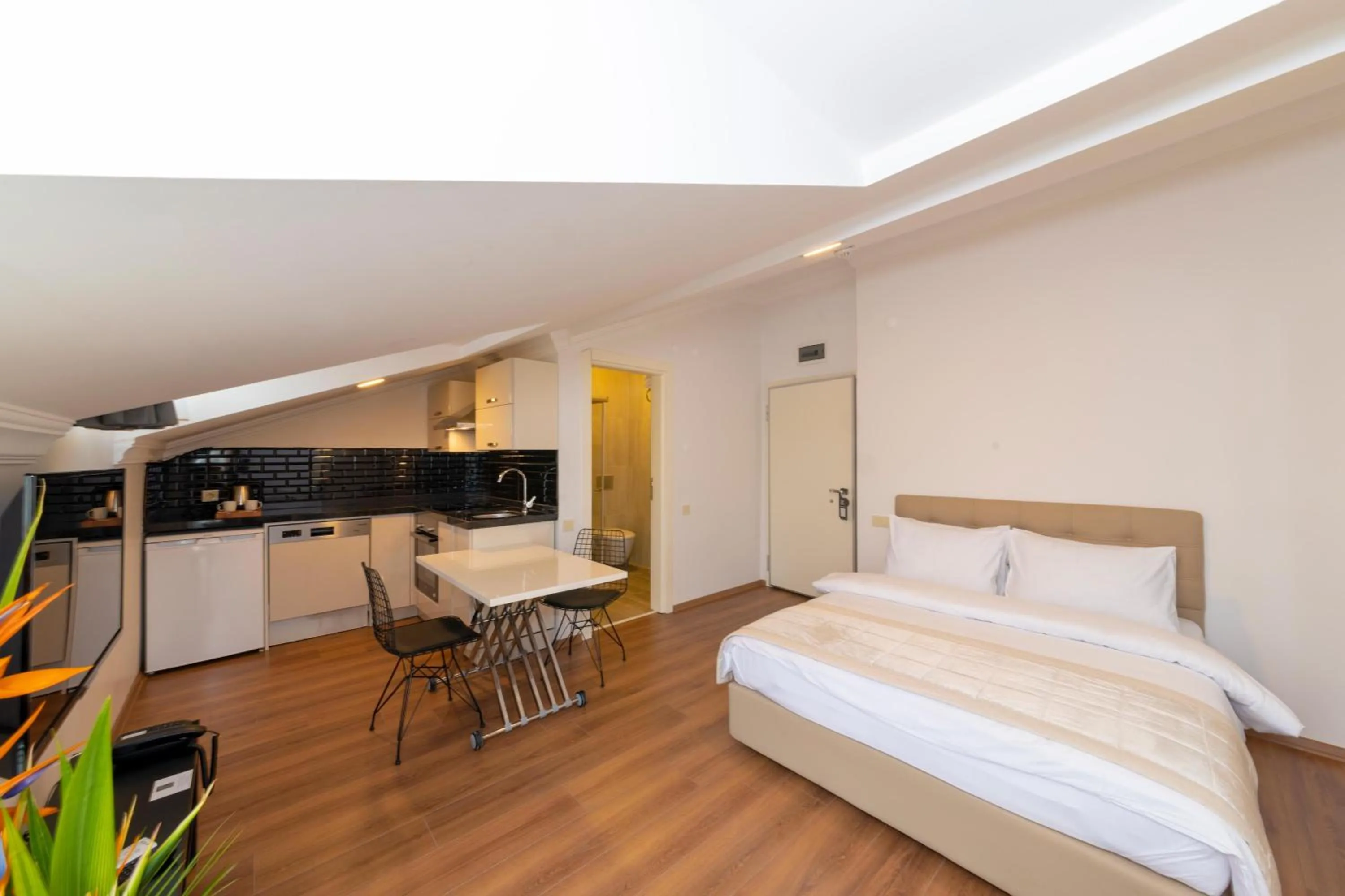 Photo of the whole room, Bed in Joy Suites