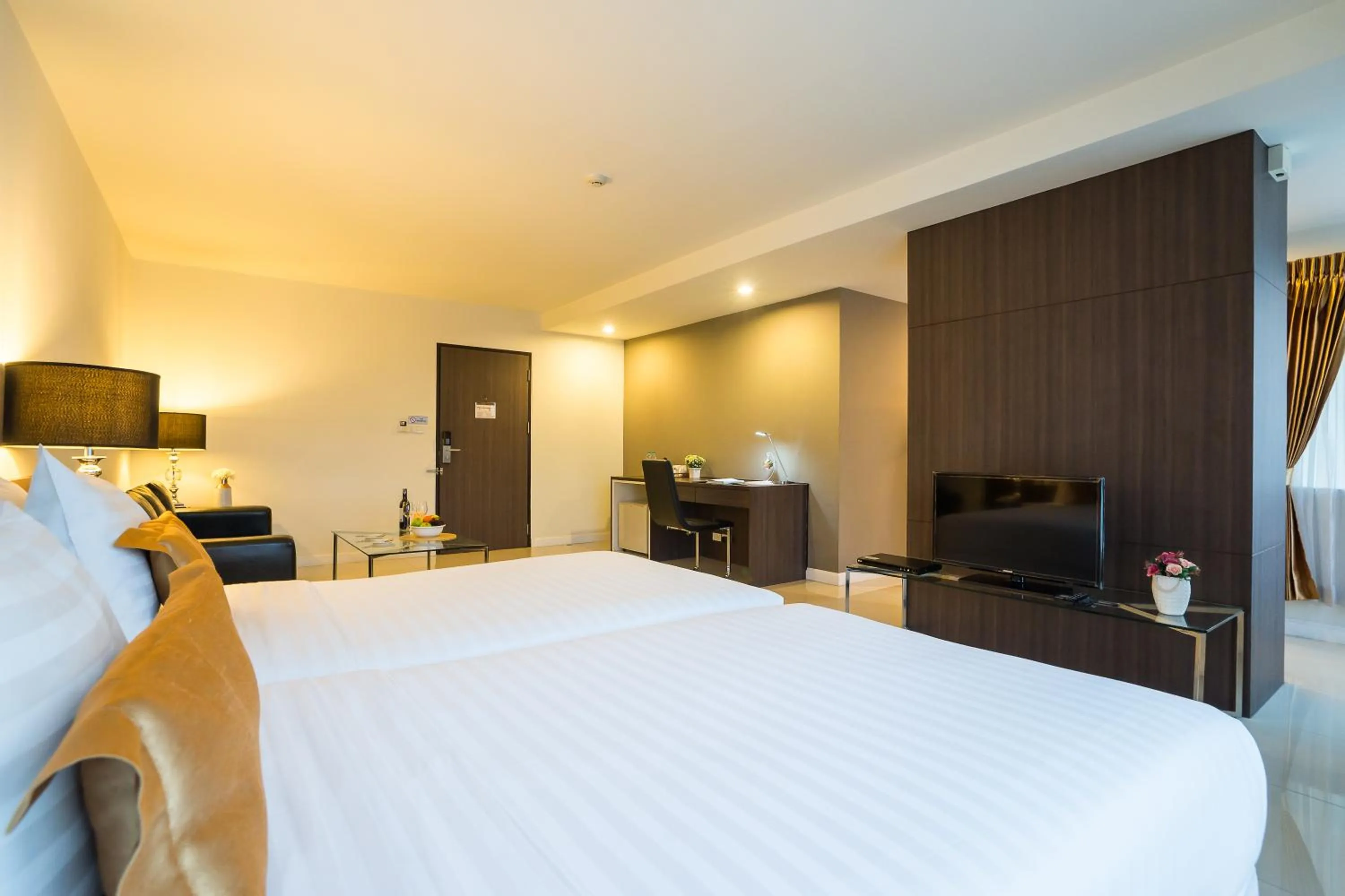 Photo of the whole room, Bed in Beyond Suite