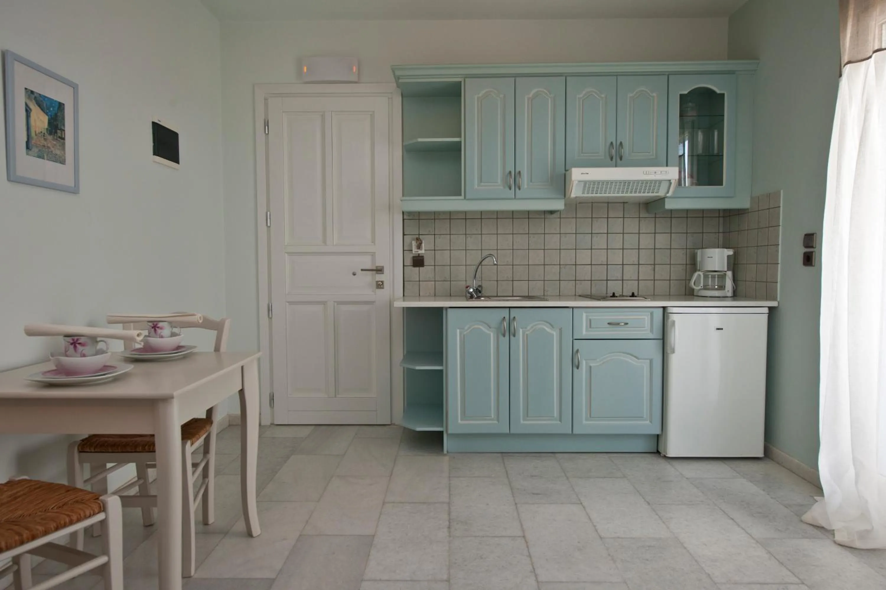 Kitchen or kitchenette in Ammos Naxos Exclusive Apartments & Studios