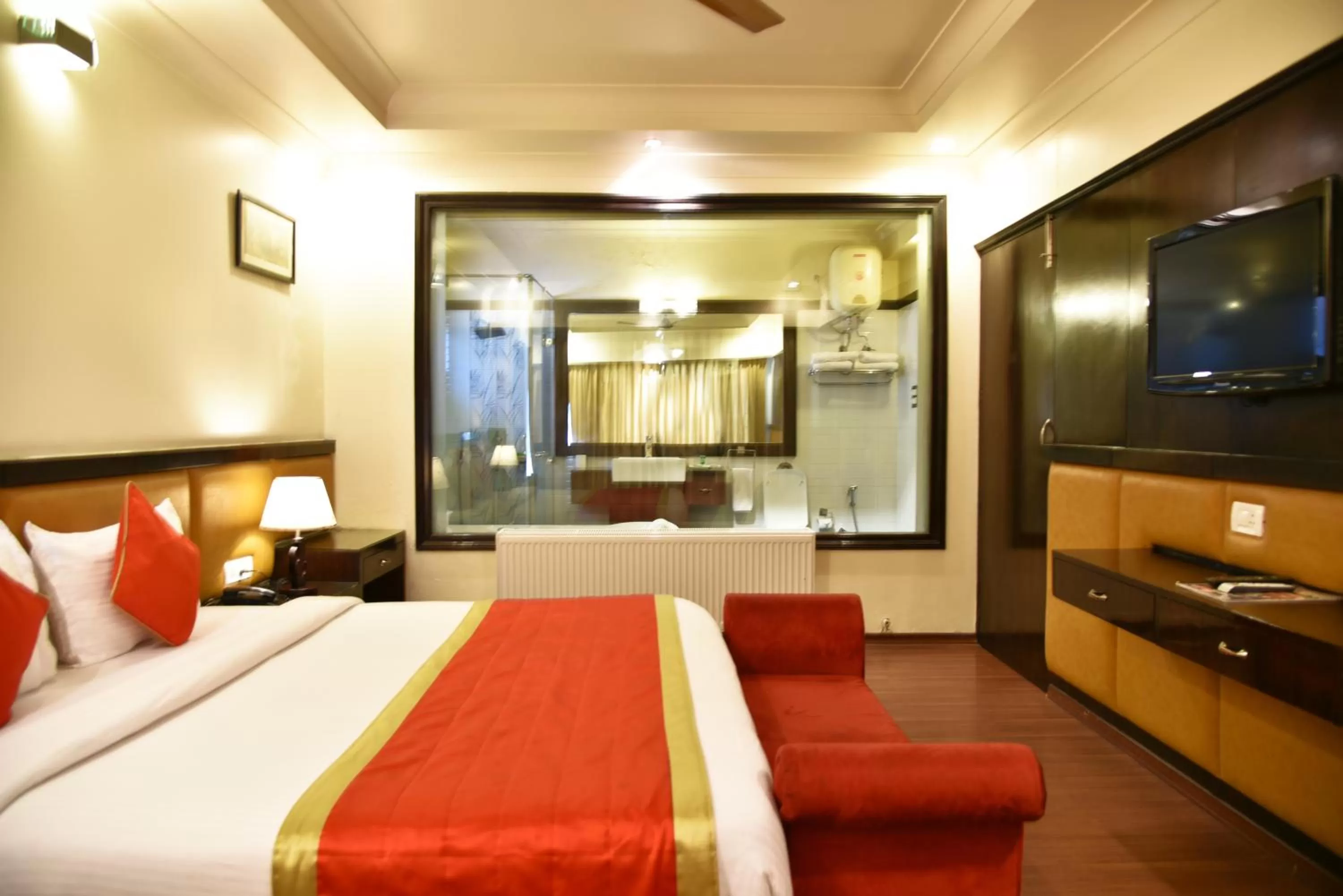 Photo of the whole room, Bed in Indraprastha Resort - Centrally Heated Rooms, with Gym, Games & Spa