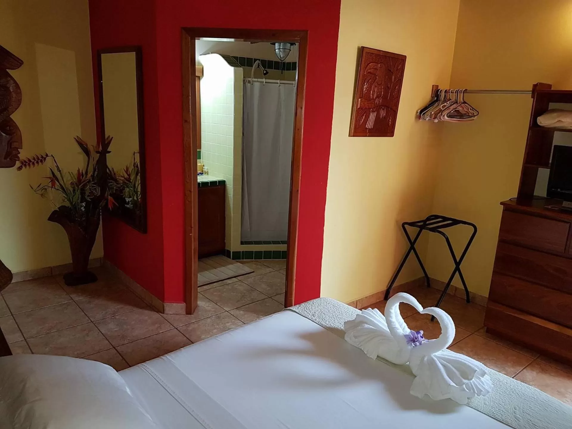 Bed in Alan's Paradise Hotel