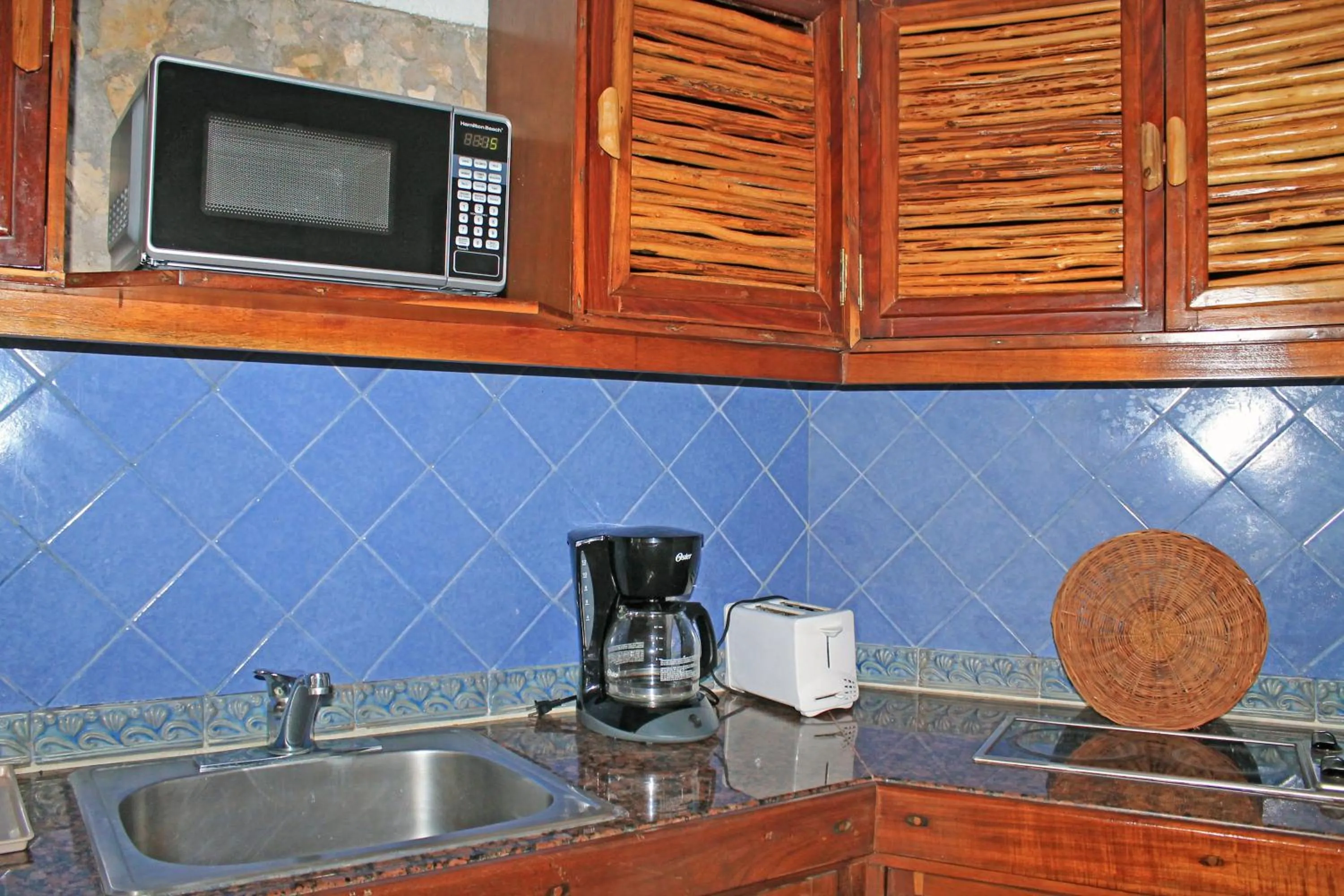 Kitchen or kitchenette in Casa del Mar Cozumel Hotel & Dive Resort with free access to an exclusive beach club