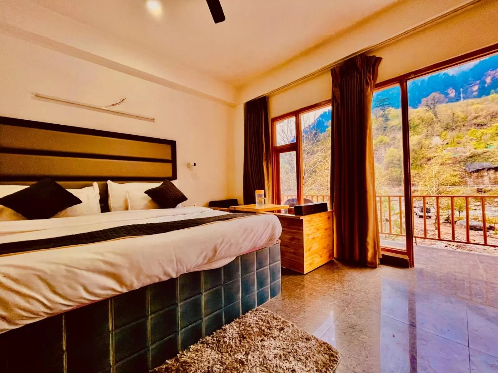 Bed in Himalayan Riverside Resort, Manali