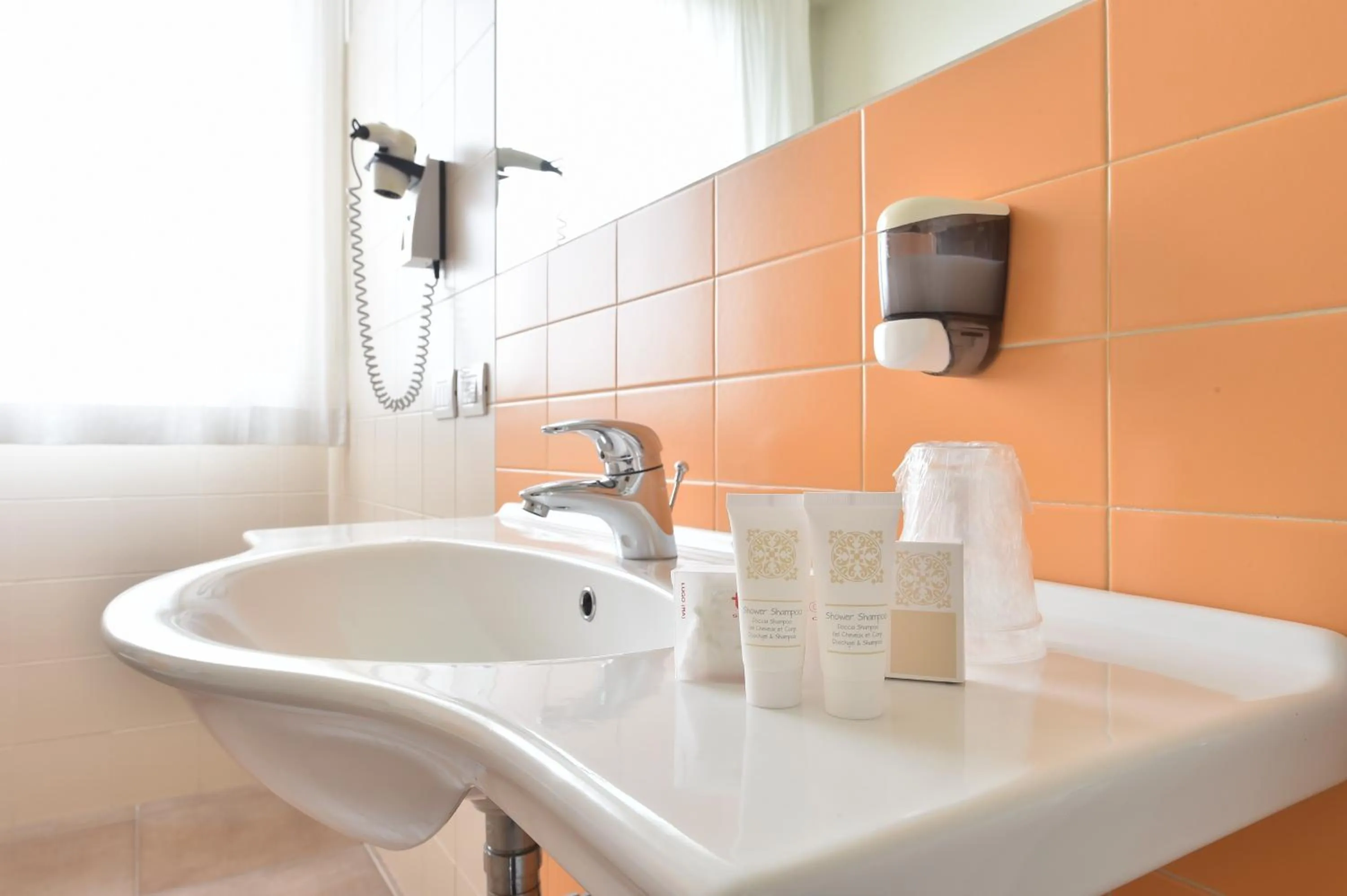 Bathroom in Tatì Hotel