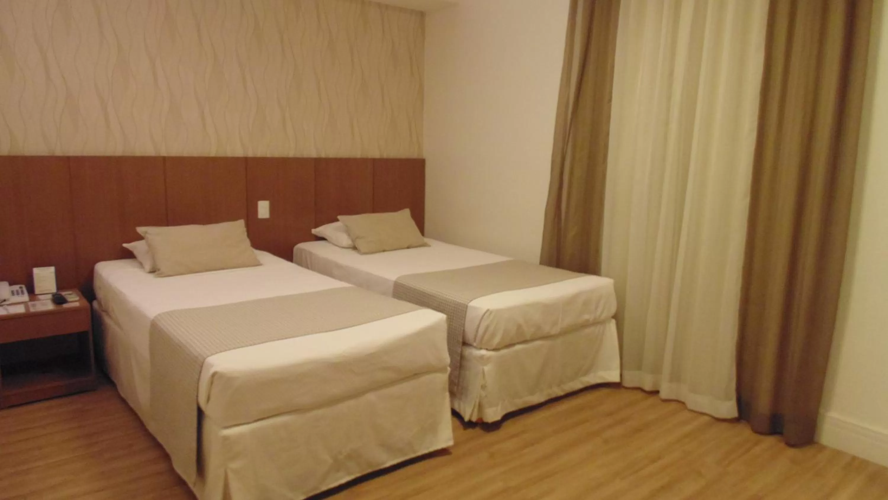 Bed in Mirasol Copacabana Hotel