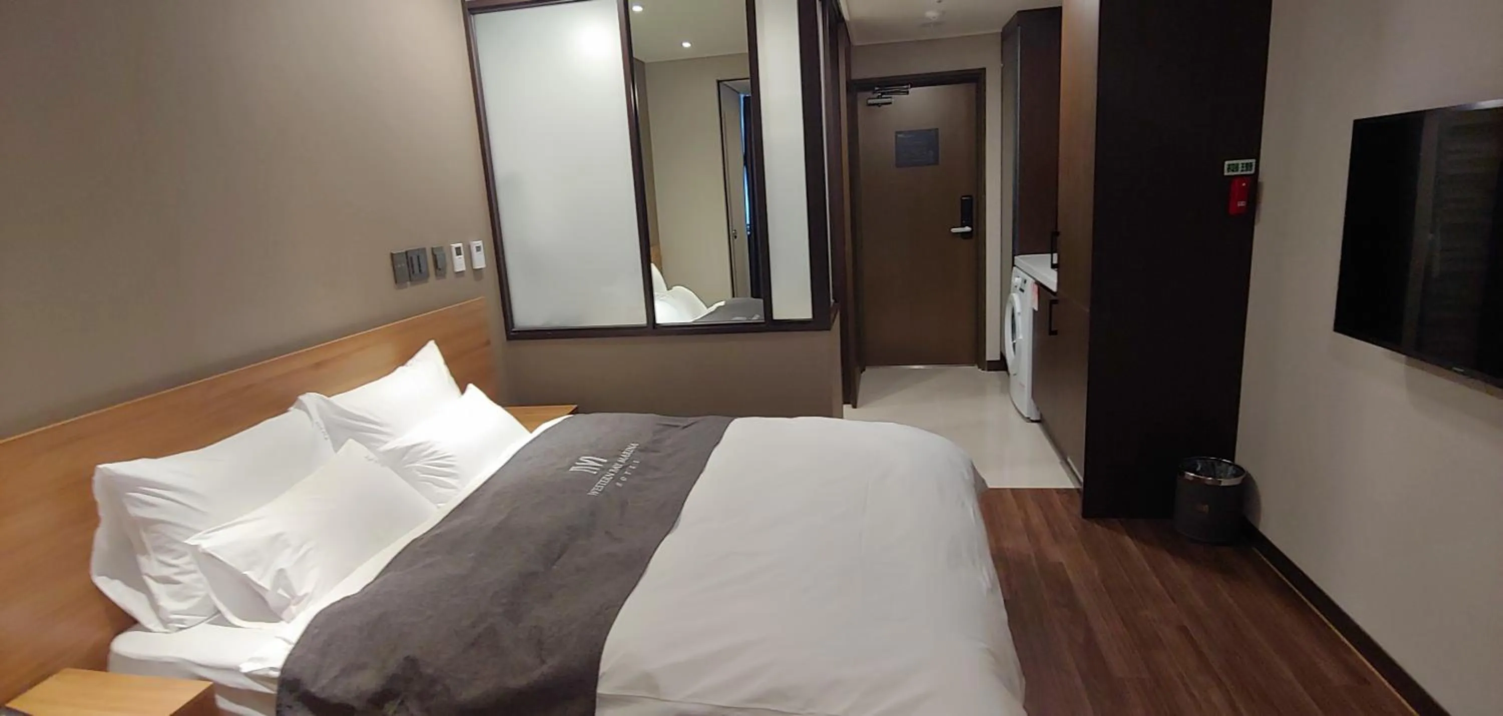 Bed in Western Bay Marina Hotel