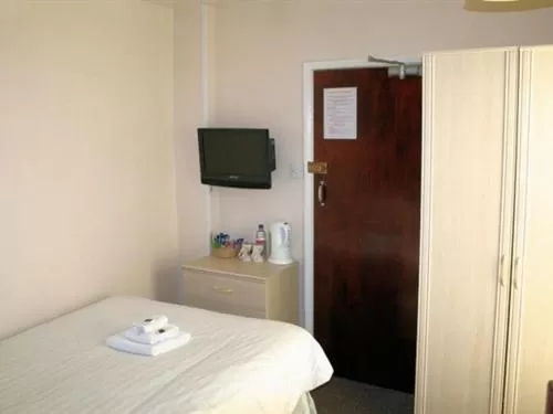 Bedroom, TV/Entertainment Center in The Trevross