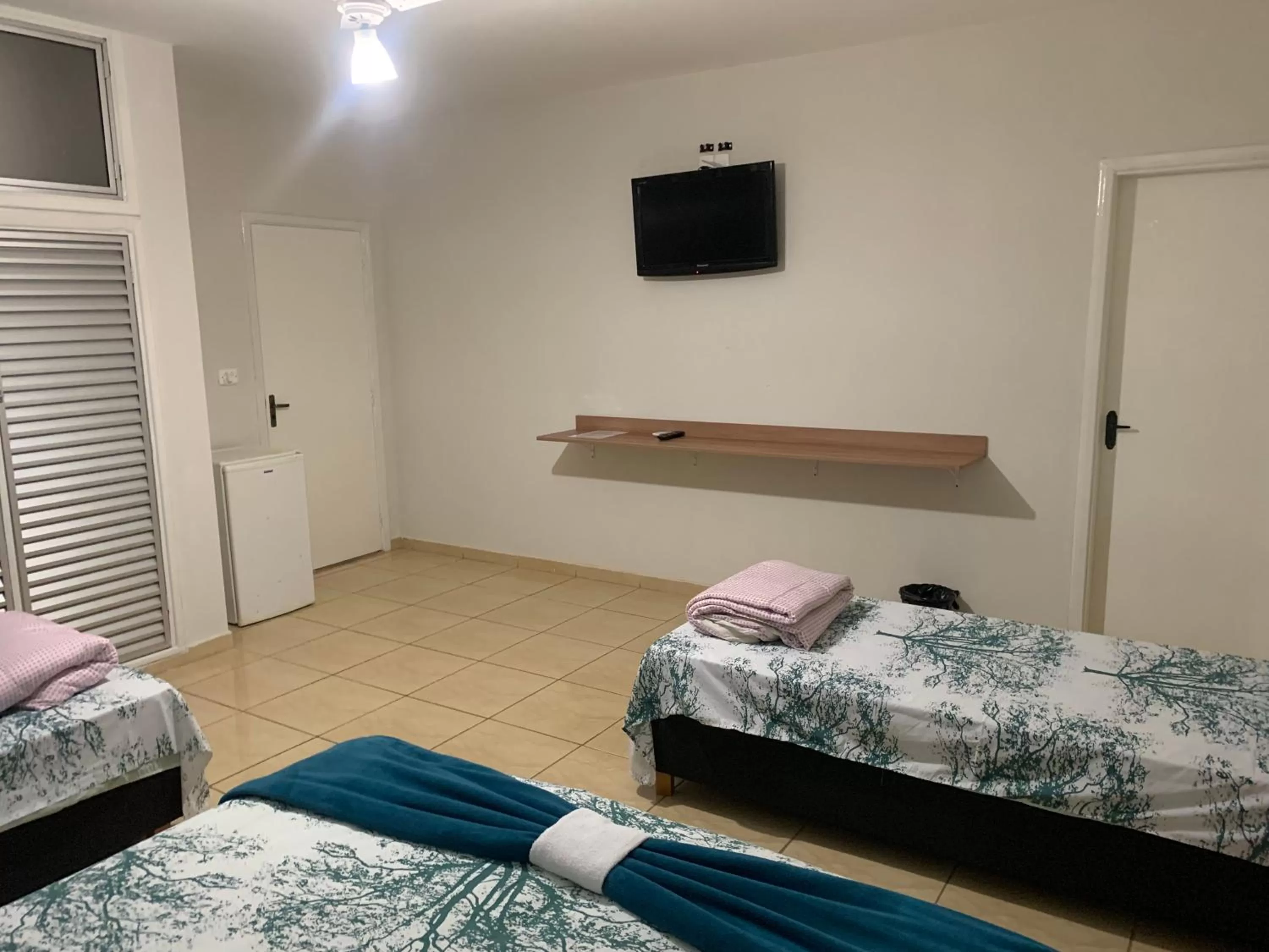 Bed in Pousada Ananda São Pedro