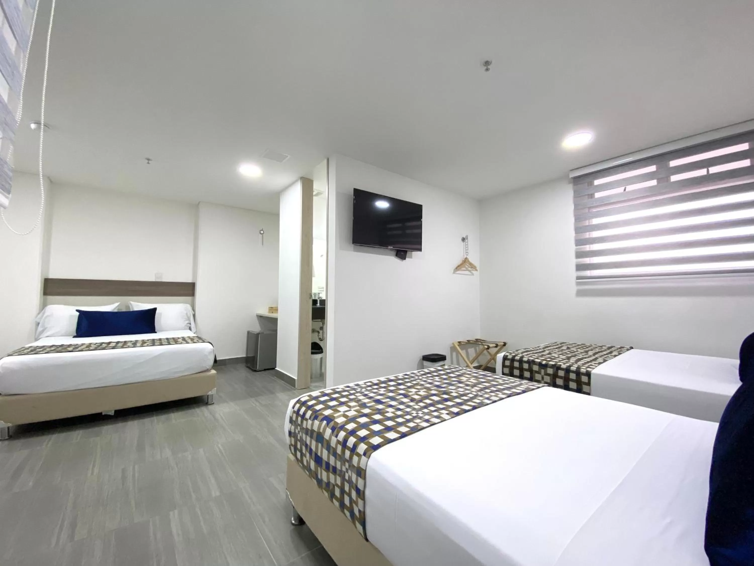 Photo of the whole room, Bed in Seven Inn Hotel