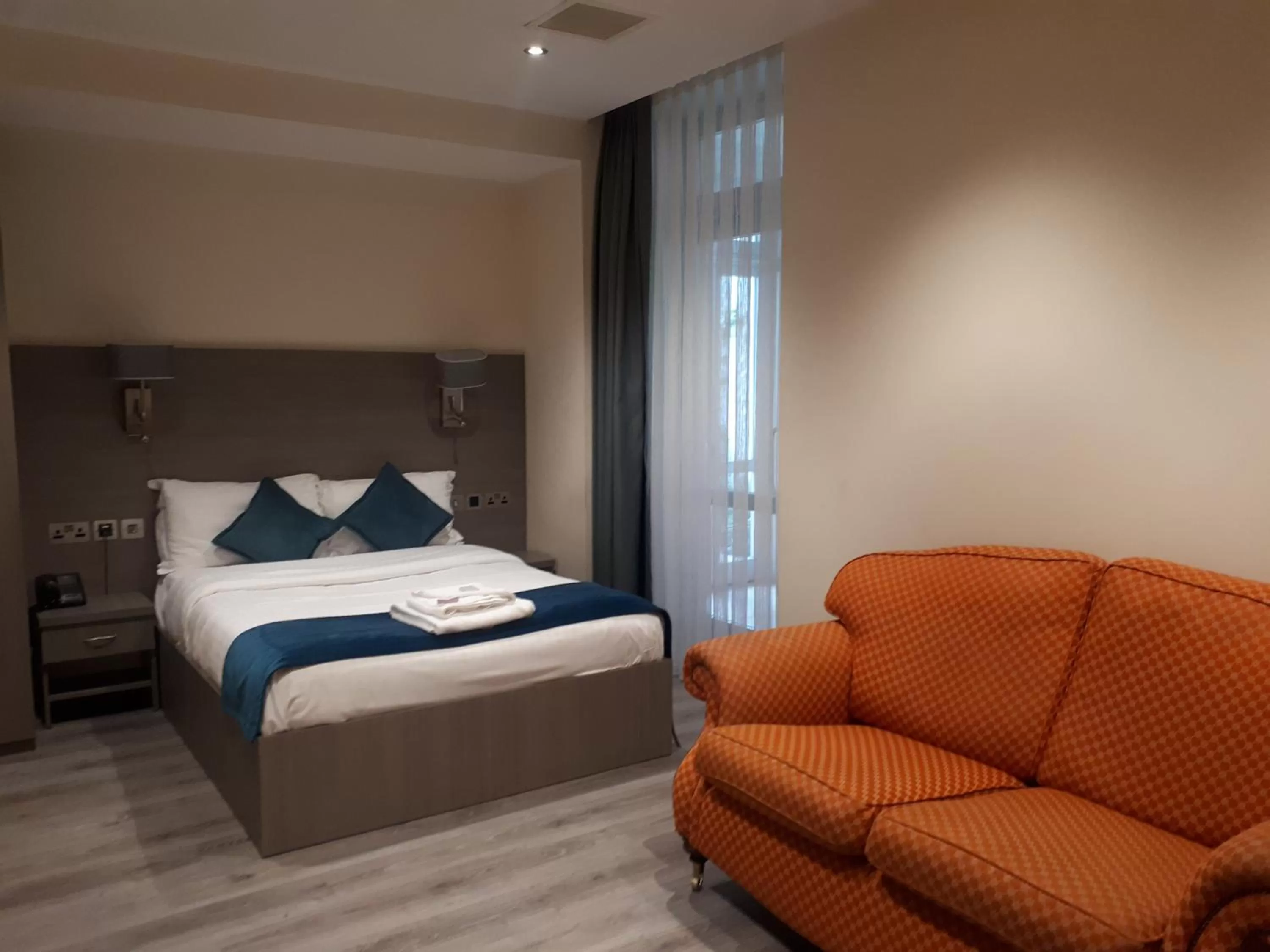 Bed in The Lion & Key Hotel