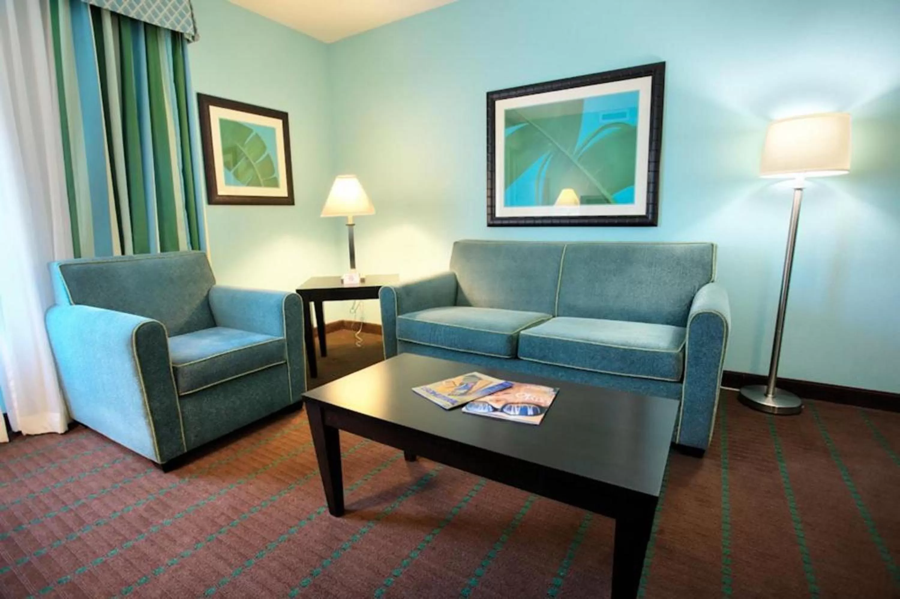 Seating area in Holiday Inn Hotel & Suites Ocala Conference Center by IHG